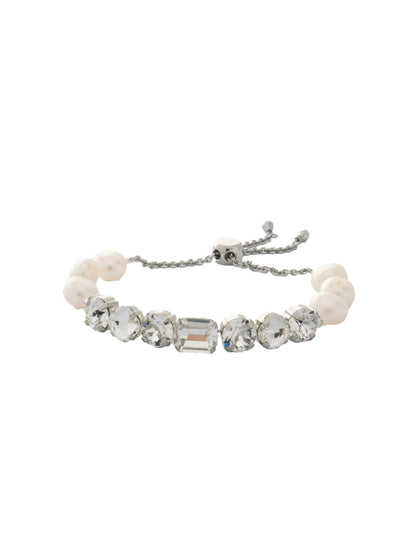 Cadenza Slider Bracelet - BEC14RHCRY - <p>A classic line bracelet reimagined with a adjustable slider clasp. A pattern of crystals and pearls give this bracelet all around allure. From Sorrelli's Crystal collection in our Palladium Silver-tone finish.</p>
