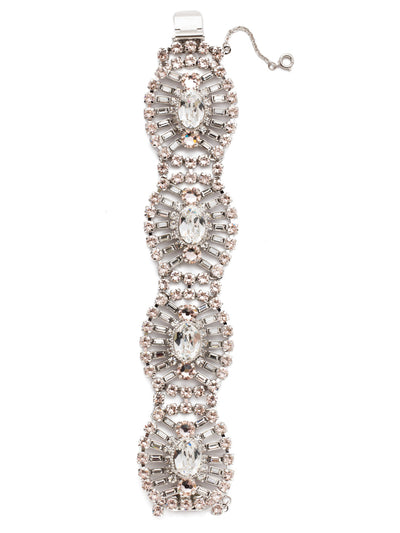 Gleaming Oval Layered Bracelet - BBZ48RHPLS - <p>A bracelet that is sure to make a statement, this classic design features an oval stone in the center of each segment with a starburst of crystal baguettes surrounding each one. The result is a decoratively textured, vintage-inspired piece that will dazzle from every angle. From Sorrelli's Soft Petal collection in our Palladium Silver-tone finish.</p>