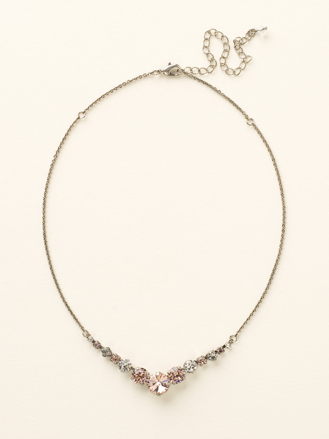 London Tennis Necklace - NCQ14ASCRR - A long, simple chain paired with gorgeous round stones is exactly what every girl needs to dress things up. This round stone necklace is perfect for layering, or to just wear alone. Let the simple sparkle take over. From Sorrelli's Crystal Rose collection in our Antique Silver-tone finish.