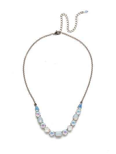 Tansy Half Line Tennis Necklace - NDQ14ASGLC - <p>Oval, round, emerald, pear and cushion cut crystals are accented by a delicate chain for subtle sparkle that looks great layered or worn solo. From Sorrelli's Glacier collection in our Antique Silver-tone finish.</p>