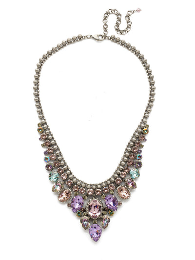 Protea Statement Statement Necklace - NDQ3ASLPA - <p>If you feel that bold is better, Protea is the necklace for you! With en elegantly edged chain and crystal for days, this statement-making style pairs perfectly with everything from your favorite party dress to jeans and a sweater! From Sorrelli's Lilac Pastel collection in our Antique Silver-tone finish.</p>