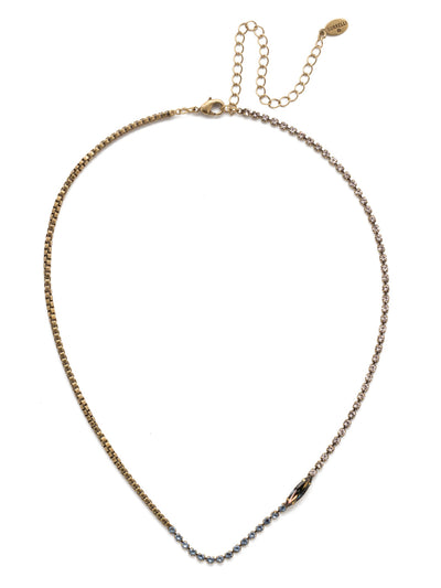 Annatalia Tennis Necklace - NEP10AGSDE - <p>What do you get when you fasten on a necklace encrusted in round crystals, showcasing an offset navette stone and a twist of metal on the side? It's our Annatalia Tennis Necklace, of course. From Sorrelli's Selvedge Denim collection in our Antique Gold-tone finish.</p>