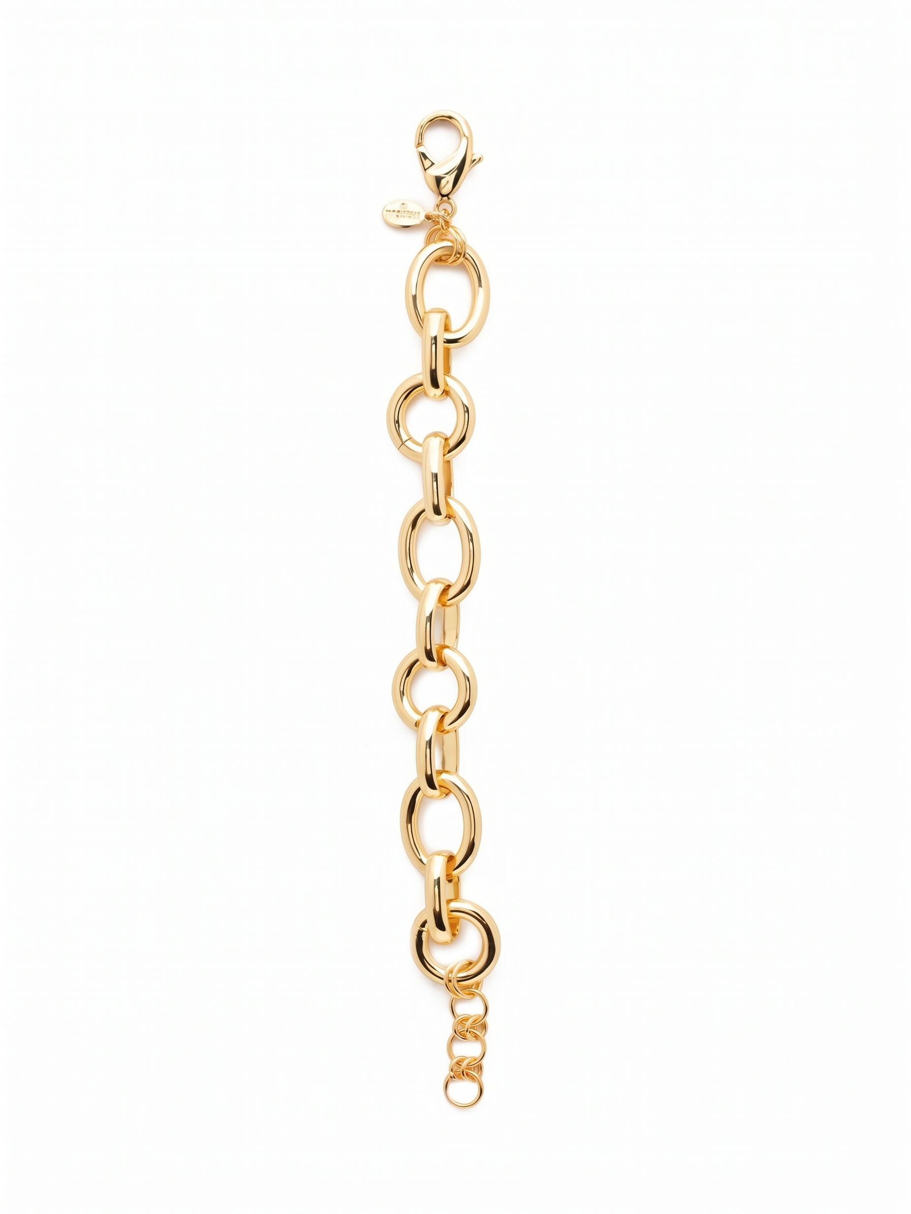 Jeanette Tennis Bracelet - 4BEV4BGMTL - <p>Alternating round and elongated oval links give this metallic chain a distinct visual rhythm. Made in a bright gold tone finish, the smooth curves reflect light with a polished, uninterrupted gleam. The substantial links offer a satisfying weight in motion, creating a fluid drape that moves naturally with you. It works as a bold anchor for a layered stack or carries enough presence to wear alone. An adjustable clasp lets you secure the perfect fit.</p><ul>
<li>Alternating round and elongated oval links create a continuous visual rhythm</li>
<li>Substantial metallic profile built for standalone impact or layered stacking</li>
<li>Lobster claw clasp</li>
<li>Protective e-coat finish for lasting wear</li>
<li>Includes signature organza pouch for gifting and travel</li>
</ul>