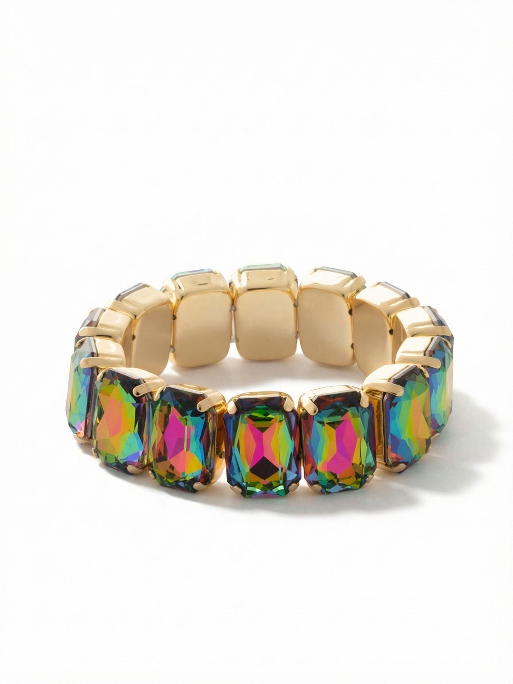 7 Inch Emerald Cut Stretch Bracelet - 4BFF70BGVO - <p>A continuous band of large emerald-cut crystals provides visual weight and an architectural profile. The stretch design slips easily over the hand, eliminating the need to navigate tricky clasps on your own. Deep prismatic flashes of magenta, teal, and violet shift across the broad rectangular facets with every movement. The flexible construction adapts to your arm in motion, remaining comfortable through long days. It carries enough visual weight to wear alone, yet adds immediate color depth when layered alongside polished gold cuffs.</p><ul>
<li>Continuous band of oversized emerald-cut crystals</li>
<li>Broad rectangular facets maximize iridescent color shifts</li>
<li>Stretch easy slip-on design</li>
<li>Protective e-coat finish for lasting wear</li>
<li>Includes signature organza pouch for gifting and travel</li>
</ul>
