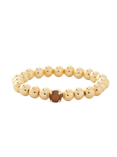 Single Crystal Stretch Bracelet - 4BFJ21BGBS - <p>Single Crystal Stretch Bracelet features repeating metal beads and a single round cut crystal on a multi-layered stretchy jewelry filament, creating a durable and trendy piece. From Sorrelli's Butterscotch collection in our Bright Gold-tone finish.</p>