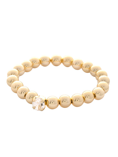 Single Crystal Stretch Bracelet - 4BFJ21BGCRY - <p>Single Crystal Stretch Bracelet features repeating metal beads and a single round cut crystal on a multi-layered stretchy jewelry filament, creating a durable and trendy piece. From Sorrelli's Crystal collection in our Bright Gold-tone finish.</p>
