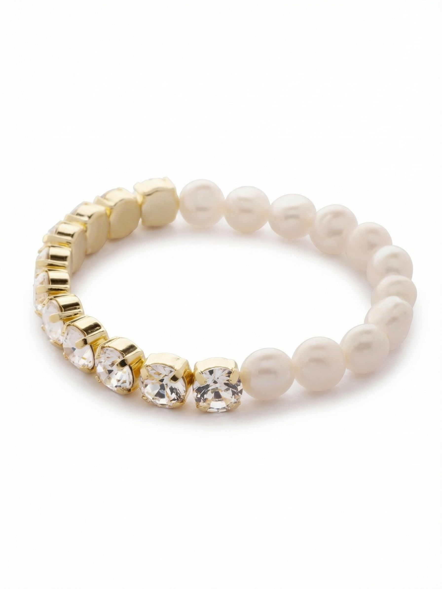 Pearl and Crystal Stretch Bracelet - 4BFJ41BGMDP - <p>A deliberate study in contrast, this stretch bracelet balances the brilliant structure of faceted clear crystals with the soft, organic shape of baroque pearls. The bright gold-tone prongs catch the light as your arm moves, while the string of pearls offers a quiet, classic counterpoint. Designed to slip easily over your hand without the need to navigate a clasp, it brings a sense of effortless, adaptable texture to your daily jewelry rotation.</p><ul>
<li>Continuous loop balancing organic pearls with structured crystal settings</li>
<li>Split design allows for versatile styling from multiple angles</li>
<li>Stretch easy slip-on design</li>
<li>Protective e-coat finish for lasting wear</li>
<li>Includes signature organza pouch for gifting and travel</li>
</ul>
