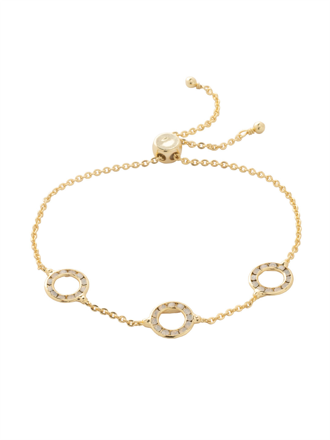 Brianna Slider Bracelet - 4BFJ7BGWO - <p>The Brianna Slider Bracelet features three round metal rings, each embellished with small crystals, and secured with an easy-to-adjust slider clasp. From Sorrelli's White Opal collection in our Bright Gold-tone finish.</p>