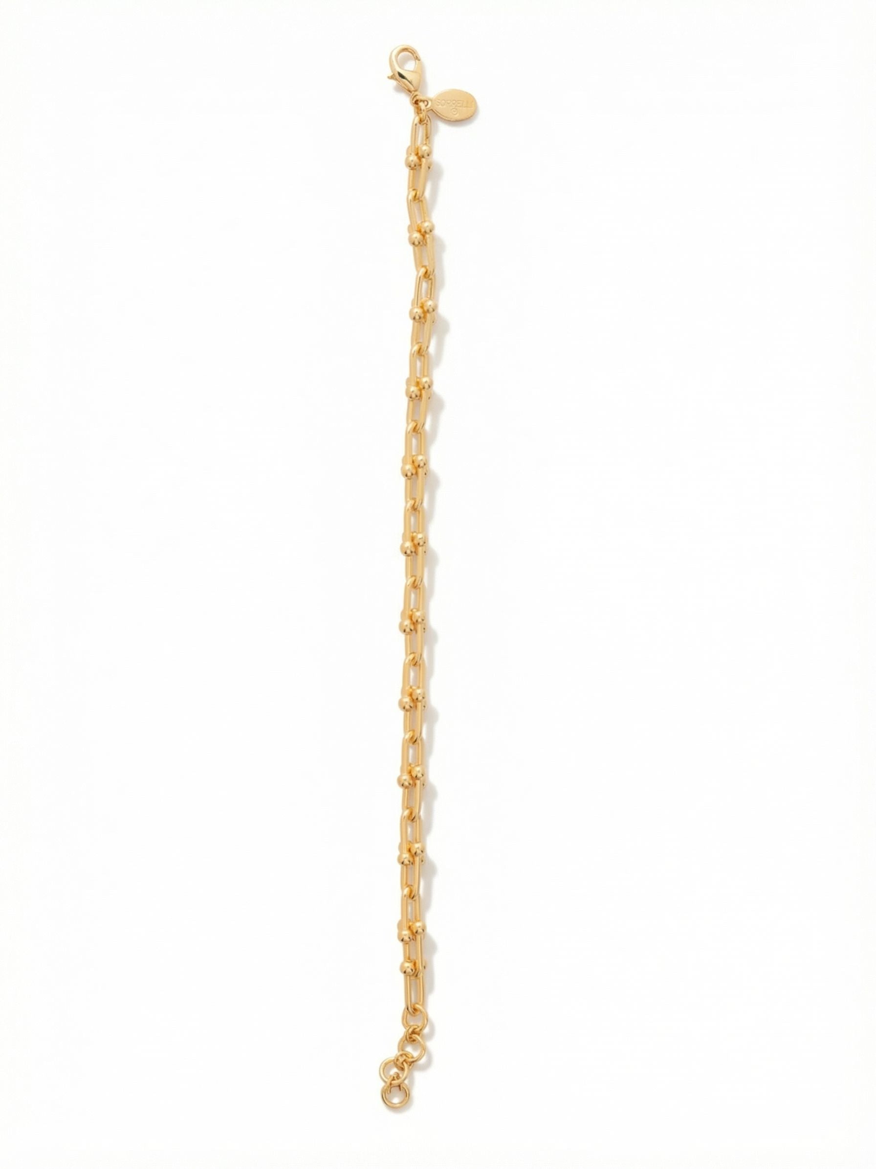Unity Tennis Bracelet - 4BFS8BGMTL - <p>A modern take on an everyday chain. The Unity bracelet connects elongated gold-tone loops with delicate bead accents, creating a continuous line of subtle texture that drapes easily with your natural movement. Its lightweight feel makes it an effortless solo piece, while the clean metallic profile anchors a layered stack. Adjust the extension chain to find your preferred length.</p><ul>
<li>Elongated open links accented with rounded bead details</li>
<li>Fluid chain construction that layers easily with other pieces</li>
<li>Lobster claw clasp</li>
<li>3/4-inch adjustable extension chain</li>
<li>Protective e-coat finish for lasting wear</li>
<li>Includes signature organza pouch for gifting and travel</li>
</ul>