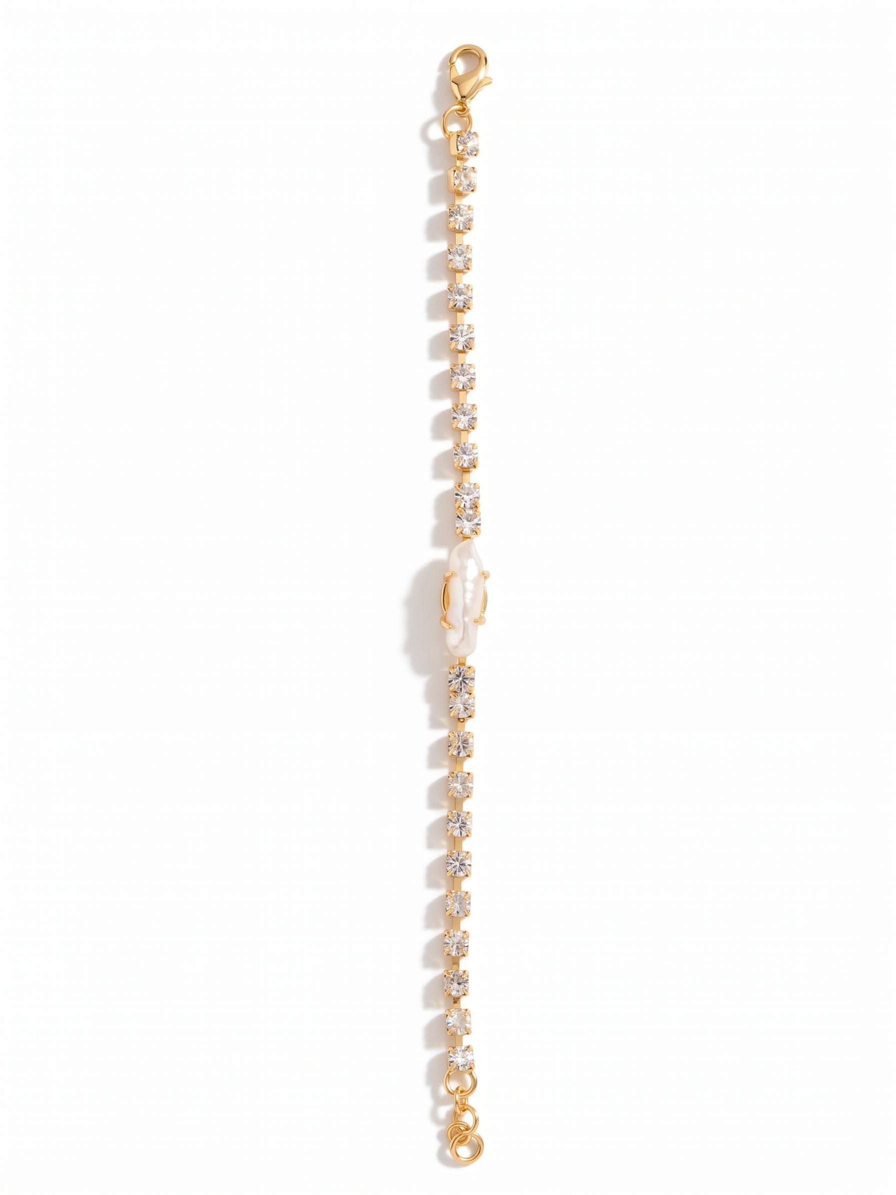 Delmar Tennis Bracelet - 4BFZ1BGMDP - <p>The Delmar Tennis Bracelet features a single freshwater pearl in the center of an adjustable crystal-embellished bracelet, secured with a lobster claw clasp.</p>