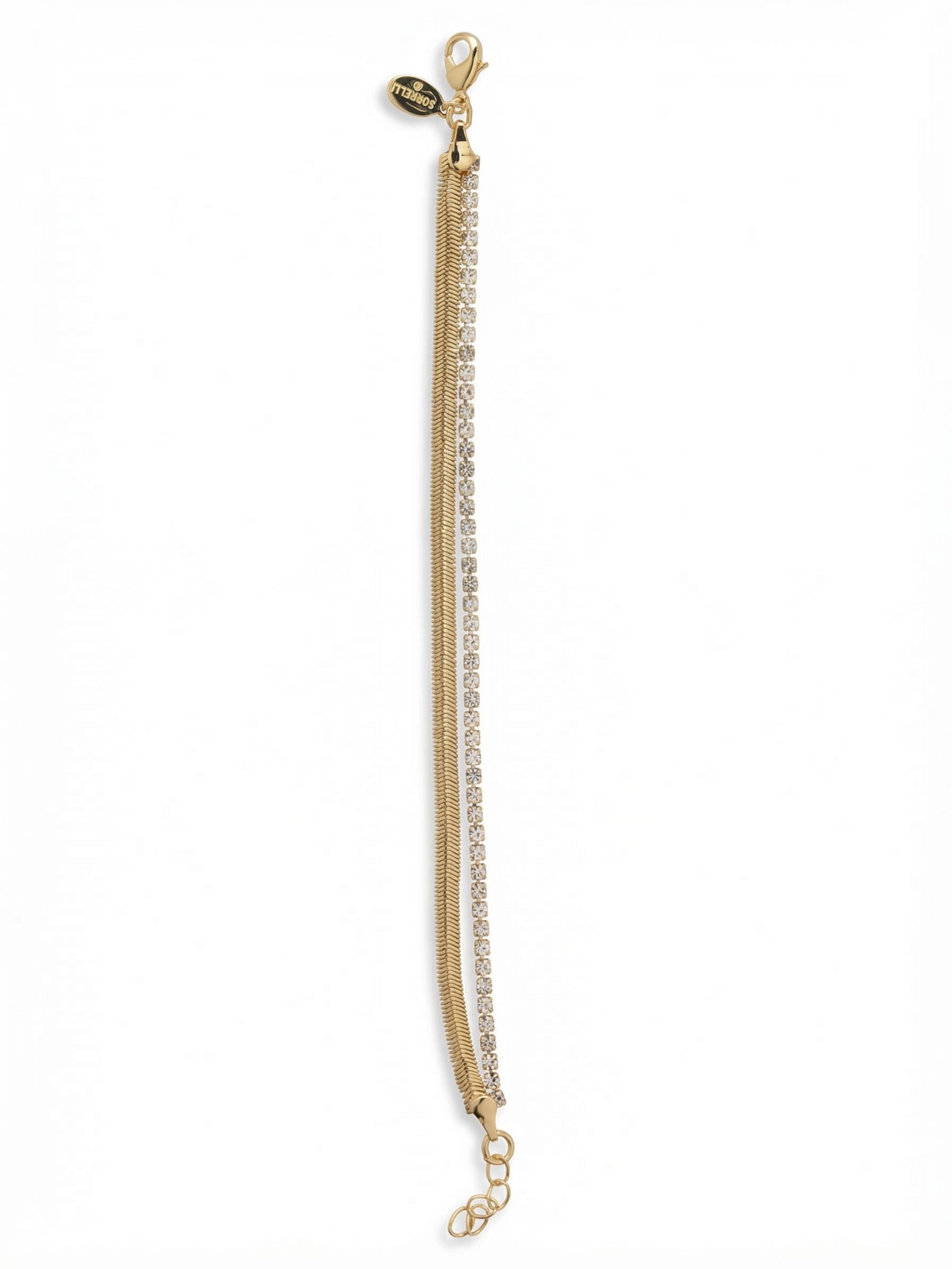 Mini Crystal Snake Chain Tennis Bracelet - 4BGB8BGCRY - <p>Two distinct textures sit side by side in this fluid design. A smooth flat snake chain rests seamlessly against a delicate line of clear crystals, creating a layered look in one effortless piece. The flexible construction drapes comfortably over the wrist and catches light with every movement. It pairs easily with a structured watch for daily wear or stands quietly on its own.</p><ul>
<li>Dual strands pair a fluid metal snake chain with a precise crystal line</li>
<li>Built-in layered design prevents the twisting typical of separate bracelets</li>
<li>Lobster claw clasp</li>
<li>3/4-inch adjustable extension chain</li>
<li>Protective e-coat finish for lasting wear</li>
<li>Includes signature organza pouch for gifting and travel</li>
</ul>
