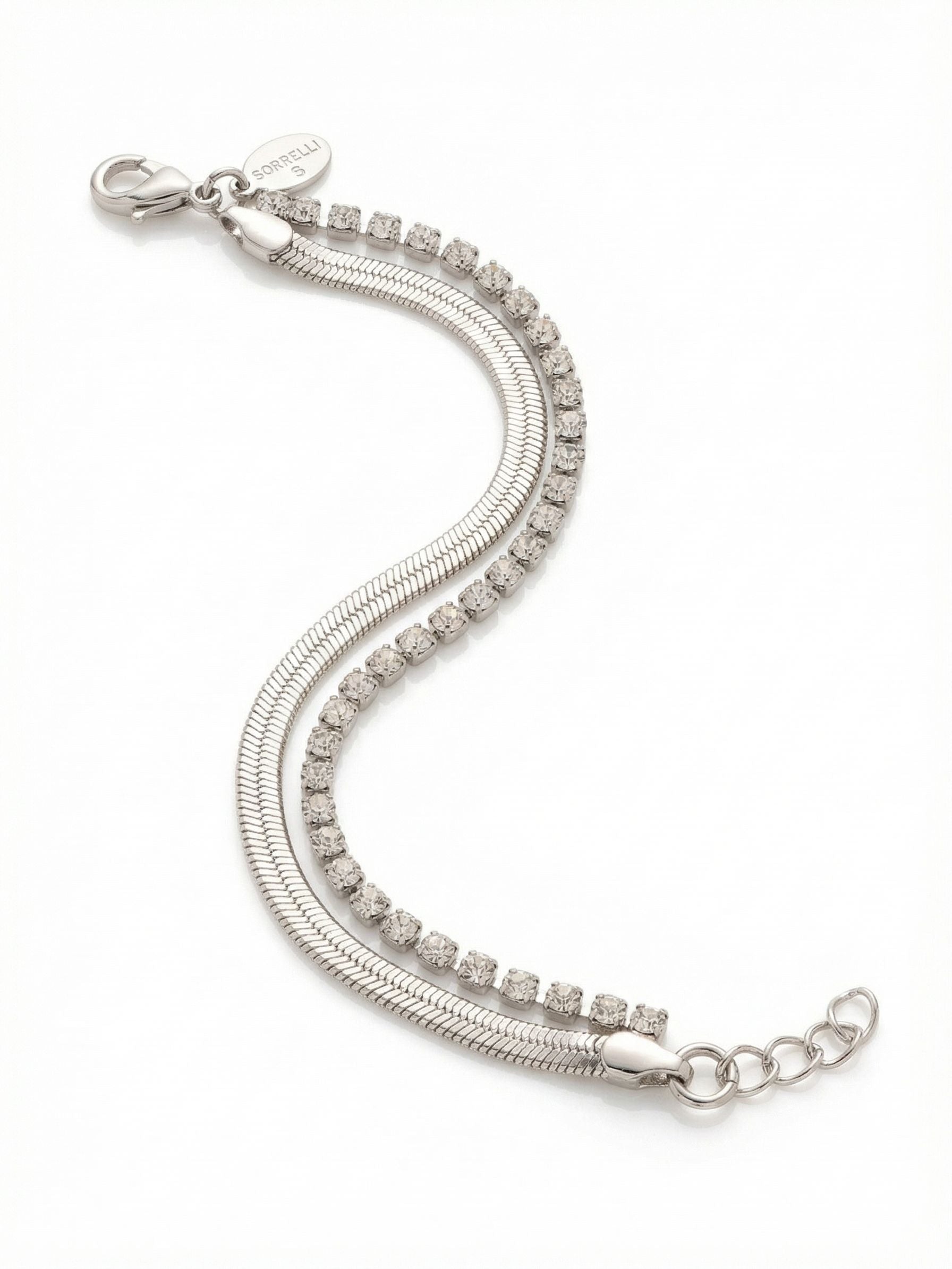Mini Crystal Snake Chain Tennis Bracelet - 4BGB8PDCRY - <p>Achieve a layered look with the simplicity of a single piece. This design pairs the fluid drape of a flat snake chain alongside the steady rhythm of a classic crystal tennis line. Joined at a single end cap, the two strands move together naturally as you go about your day. It creates the illusion of a carefully curated stack that catches the light beautifully, whether you wear it solo or styled alongside your favorite watch.</p><ul>
<li>Dual-strand construction pairing a fluid snake chain with a classic crystal line</li>
<li>Pre-layered design prevents tangling while maintaining natural movement on the arm</li>
<li>Lobster claw clasp</li>
<li>3/4-inch adjustable extension chain</li>
<li>Protective e-coat finish for lasting wear</li>
<li>Includes signature organza pouch for gifting and travel</li>
</ul>