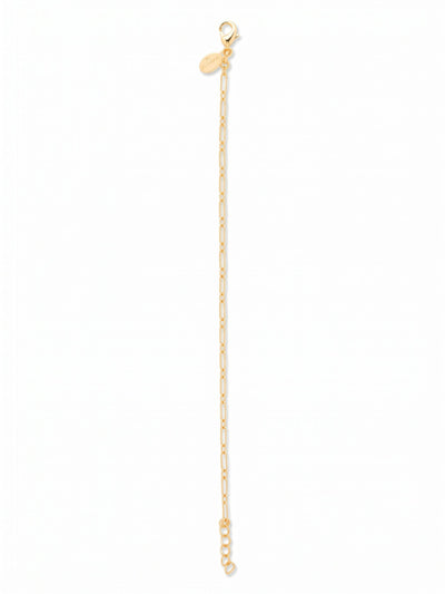 Simple Chain Tennis Bracelet - 4BGE3BGMTL - <p>A foundational piece for your rotation, this delicate chain catches the light through alternating elongated links. The bright gold-tone metal offers a fluid drape that looks intentional worn solo and layers seamlessly beside heavier cuffs or crystal tennis styles. An extension chain lets you adjust how it drops along your arm.</p><ul>
<li>Alternating elongated and round links create a fluid, airy texture</li>
<li>Minimalist metallic design built for versatile everyday layering</li>
<li>Lobster claw clasp</li>
<li>3/4-inch adjustable extension chain</li>
<li>Protective e-coat finish for lasting wear</li>
<li>Includes signature organza pouch for gifting and travel</li>
</ul>