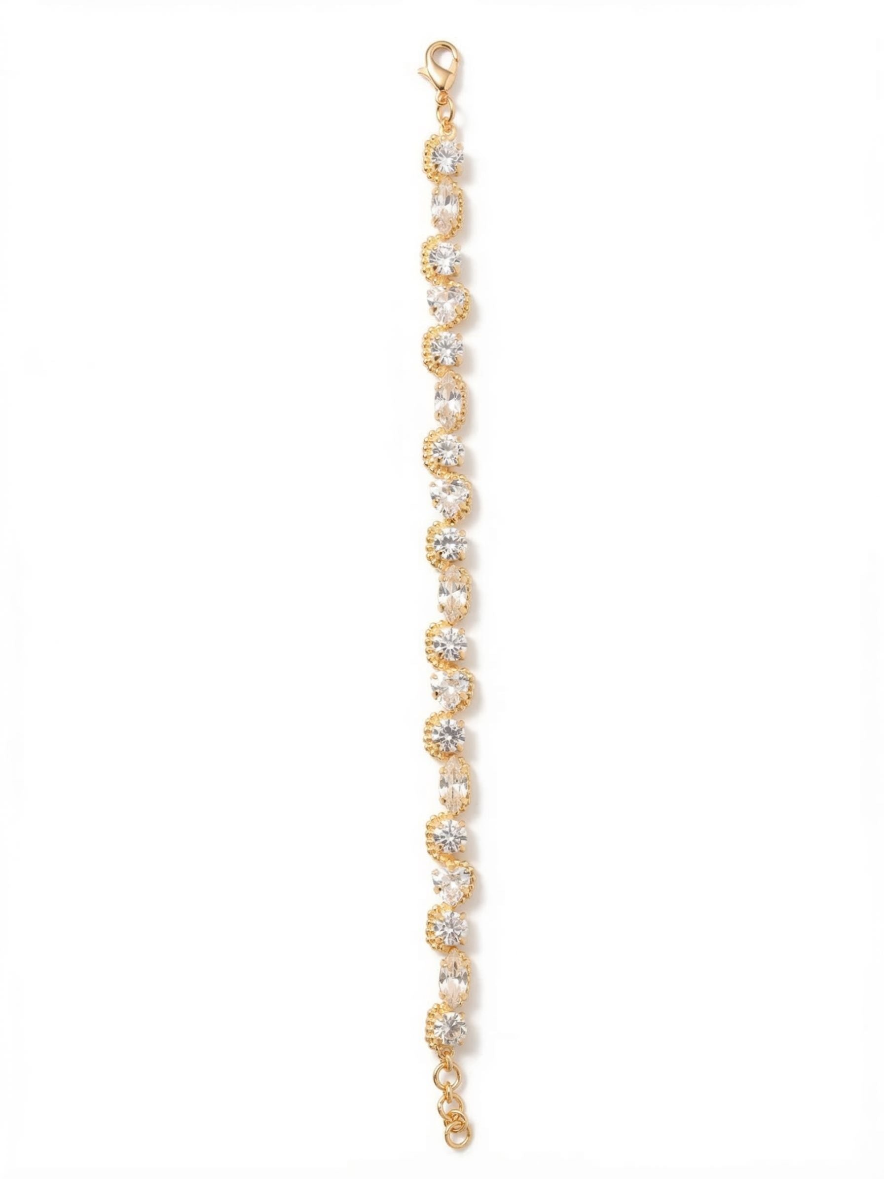 Rene Tennis Bracelet - 4BGI2BGCRY - <p>A modern take on the classic tennis silhouette. This design interlaces trillion, marquise, and round clear crystals to build a continuous line of light that shifts with your movement. Delicate ball chain detailing hugs alternating stones, creating a subtle, scalloped rhythm along the edge. The piece moves fluidly with your arm, bringing a sharp, textural contrast to a daily stack. A lobster clasp and extension chain allow you to tailor the drape perfectly.</p><ul>
<li>Unexpected visual rhythm created by mixing round, marquise, and trillion crystal cuts</li>
<li>Delicate ball chain wrapping creates a softly scalloped border along the round stones</li>
<li>Lobster claw clasp</li>
<li>3/4-inch adjustable extension chain</li>
<li>Protective e-coat finish for lasting wear</li>
<li>Includes signature organza pouch for gifting and travel</li>
</ul>