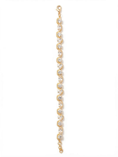 Rene Tennis Bracelet - 4BGI2BGCRY - <p>A modern take on the classic tennis silhouette. This design interlaces trillion, marquise, and round clear crystals to build a continuous line of light that shifts with your movement. Delicate ball chain detailing hugs alternating stones, creating a subtle, scalloped rhythm along the edge. The piece moves fluidly with your arm, bringing a sharp, textural contrast to a daily stack. A lobster clasp and extension chain allow you to tailor the drape perfectly.</p><ul>
<li>Unexpected visual rhythm created by mixing round, marquise, and trillion crystal cuts</li>
<li>Delicate ball chain wrapping creates a softly scalloped border along the round stones</li>
<li>Lobster claw clasp</li>
<li>3/4-inch adjustable extension chain</li>
<li>Protective e-coat finish for lasting wear</li>
<li>Includes signature organza pouch for gifting and travel</li>
</ul>