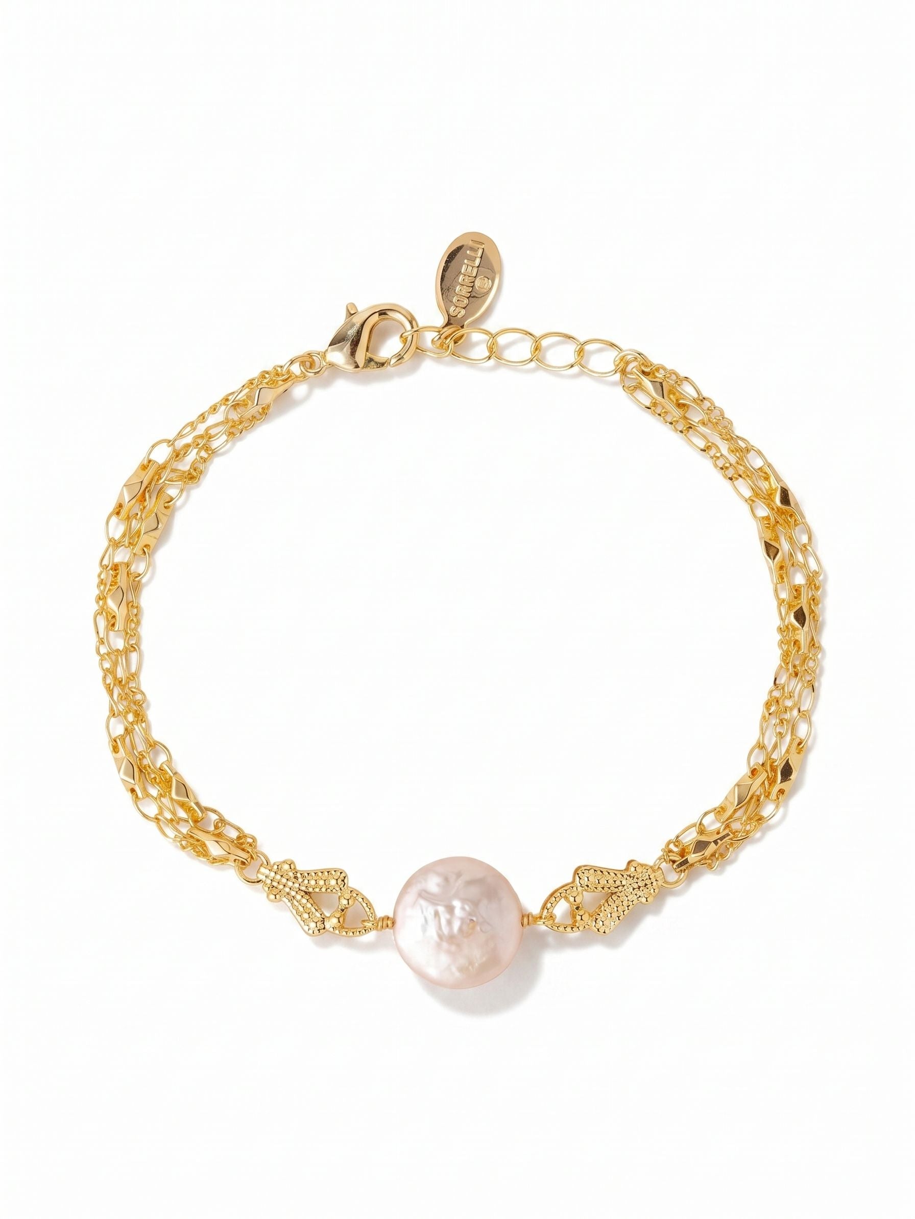 Aislin Tennis Bracelet - 4BGK4BGMDP - <p>A slender chain anchors a single white coin pearl to create a quiet focal point on the arm. The distinct flat profile of the pearl feels weightless and moves naturally as you go about your day. Offering a subtle wash of warmth, this delicate piece works beautifully on its own or layered among heavier links and vintage watches. An extension chain allows you to easily adjust the drape for a tailored, comfortable fit.</p><ul>
<li>Single coin pearl station creates a minimalist focal point</li>
<li>Delicate profile designed for seamless everyday layering</li>
<li>Lobster claw clasp</li>
<li>3/4-inch adjustable extension chain</li>
<li>Protective e-coat finish for lasting wear</li>
<li>Includes signature organza pouch for gifting and travel</li>
</ul>