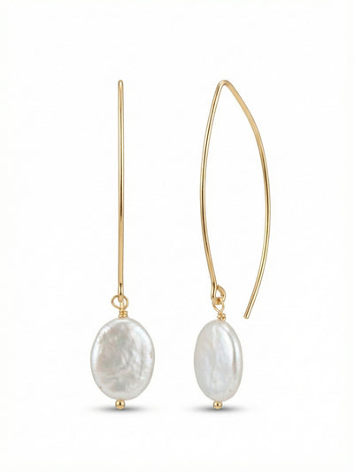 Finch Dangle Earrings - 4EES51BGMDP - <p>A sleek arc of wire suspends a single white coin pearl, creating an elongated line that moves gracefully with you. The natural, irregular texture of the pearl catches the light, offering a subtle contrast to the polished metal above. Threaded on a gracefully curved French wire, the design provides a gentle hold that remains comfortable all day. The lightweight construction ensures the pearl sways freely, bringing a quiet sense of movement to an understated silhouette.</p><ul>
<li>Elongated architectural wire silhouette</li>
<li>Organic textured flat coin pearl profile</li>
<li>Hook drop for easy, lightweight wear</li>
<li>Protective e-coat finish for lasting wear</li>
<li>Includes signature organza pouch for gifting and travel</li>
</ul>