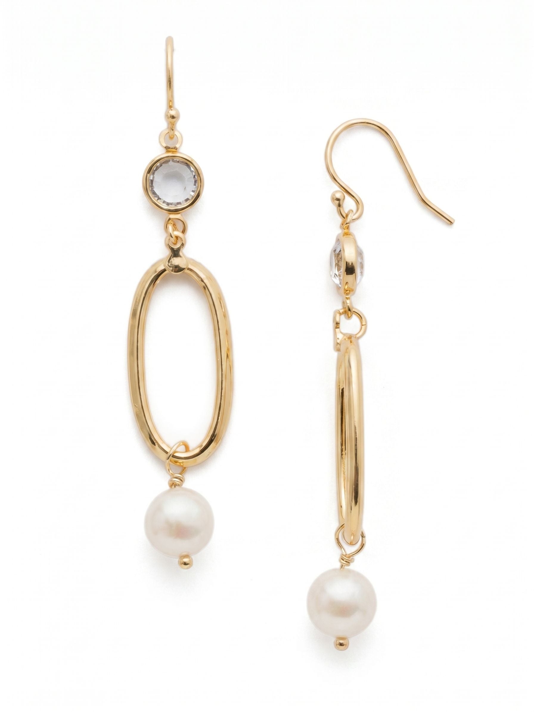 Melody Dangle Earring - 4EET5BGMDP - <p>Open, airy, and beautiful describe the Melody Dangle Earrings perfectly. A single metal oval sits base to a delicate crystal and modern freshwater pearl. From Sorrelli's Modern Pearl collection in our Bright Gold-tone finish.</p>