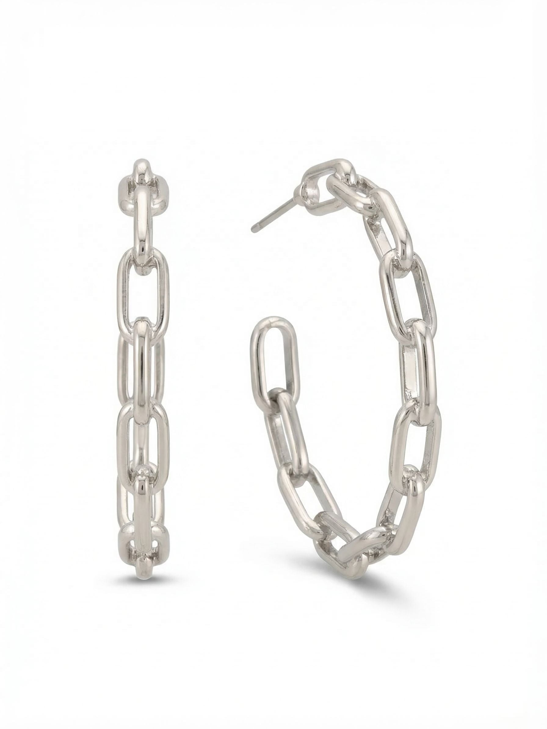 Chain Link Hoop Earrings - 4EFJ8PDMTL - <p>A structured take on a daily staple. These open hoops are formed from a rigid paperclip chain, using elongated rectangular links to create an airy profile that catches the light. Cast in cool palladium, they deliver a substantial, polished look without unnecessary weight. Measuring just over an inch, they offer enough presence to anchor your outfit but remain incredibly easy to wear. An oversized comfort clutch secures the post closure, keeping the metal balanced and upright from morning until night.</p><ul>
<li>Rigid paperclip links form a structured open silhouette</li>
<li>Elongated rectangular links create an airy visual profile</li>
<li>Post with oversized comfort-clutch back</li>
<li>Protective e-coat finish for lasting wear</li>
<li>Includes signature organza pouch for gifting and travel</li>
</ul>