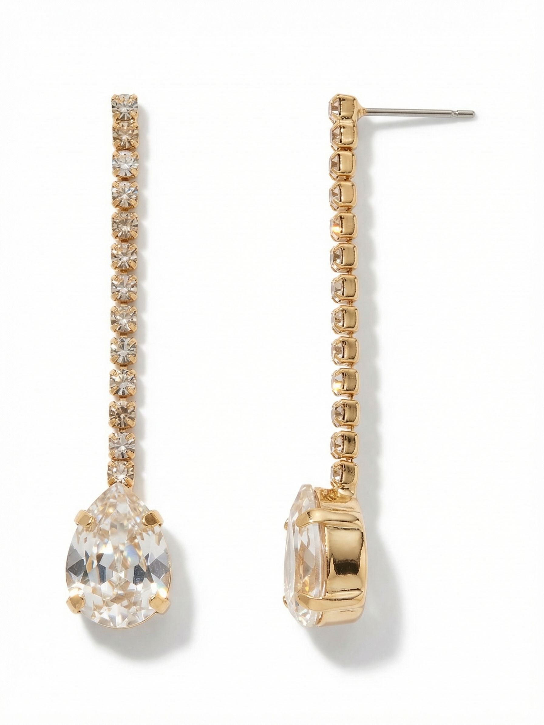 Dianna Dangle Earrings - 4EFS4BGCRY - <p>A continuous thread of rhinestone chain drops directly from the post, culminating in a solitary pear-cut crystal. This linear design creates two inches of fluid movement, reflecting light naturally with every turn of your head. Despite the length, the construction remains incredibly lightweight. Our oversized comfort clutch holds the post firmly in place, ensuring the slender drop stays perfectly vertical throughout the day. It offers a clean, architectural approach to crystal that complements a simple silhouette.</p><ul>
<li>Fluid rhinestone chain construction for continuous linear movement</li>
<li>Solitary pear-cut crystal anchors the slender vertical drop</li>
<li>Post with oversized comfort-clutch back</li>
<li>Protective e-coat finish for lasting wear</li>
<li>Includes signature organza pouch for gifting and travel</li>
</ul>