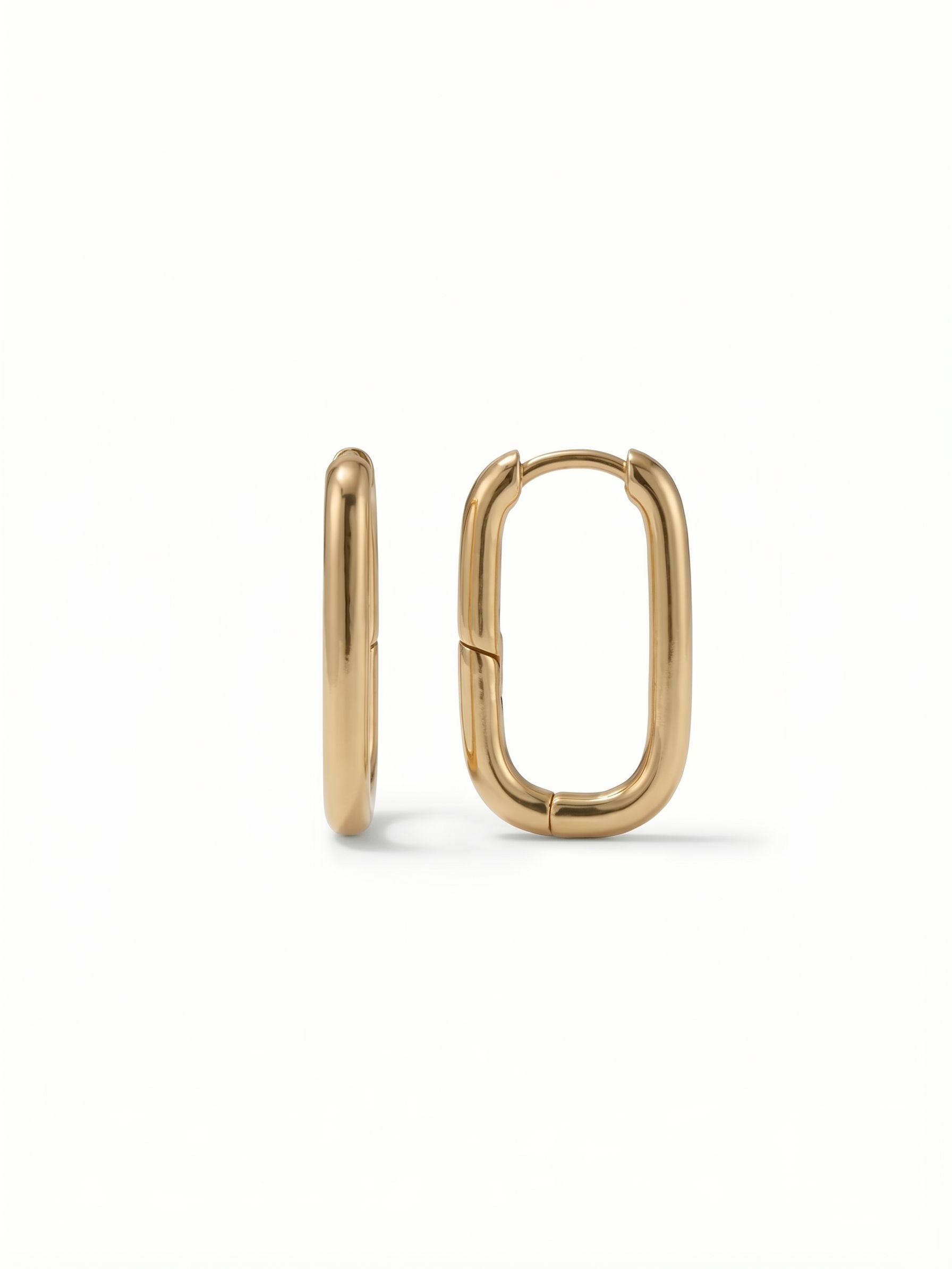 Rectangle Hoop Earrings - 4EFY1BGMTL - <p>A modern shift from the traditional round hoop. These elongated rectangular earrings offer clean lines and softened corners that reflect the light with a continuous, bright shine. Worn close to the face, the one-inch scale provides enough volume to feel substantial while remaining light enough to easily anchor your daily wardrobe rotation.</p><ul>
<li>Clean rectangular profile with softened, rounded corners</li>
<li>Tubular metal construction balances visual weight with everyday comfort</li>
<li>Hoop earring</li>
<li>Protective e-coat finish for lasting wear</li>
<li>Includes signature organza pouch for gifting and travel</li>
</ul>