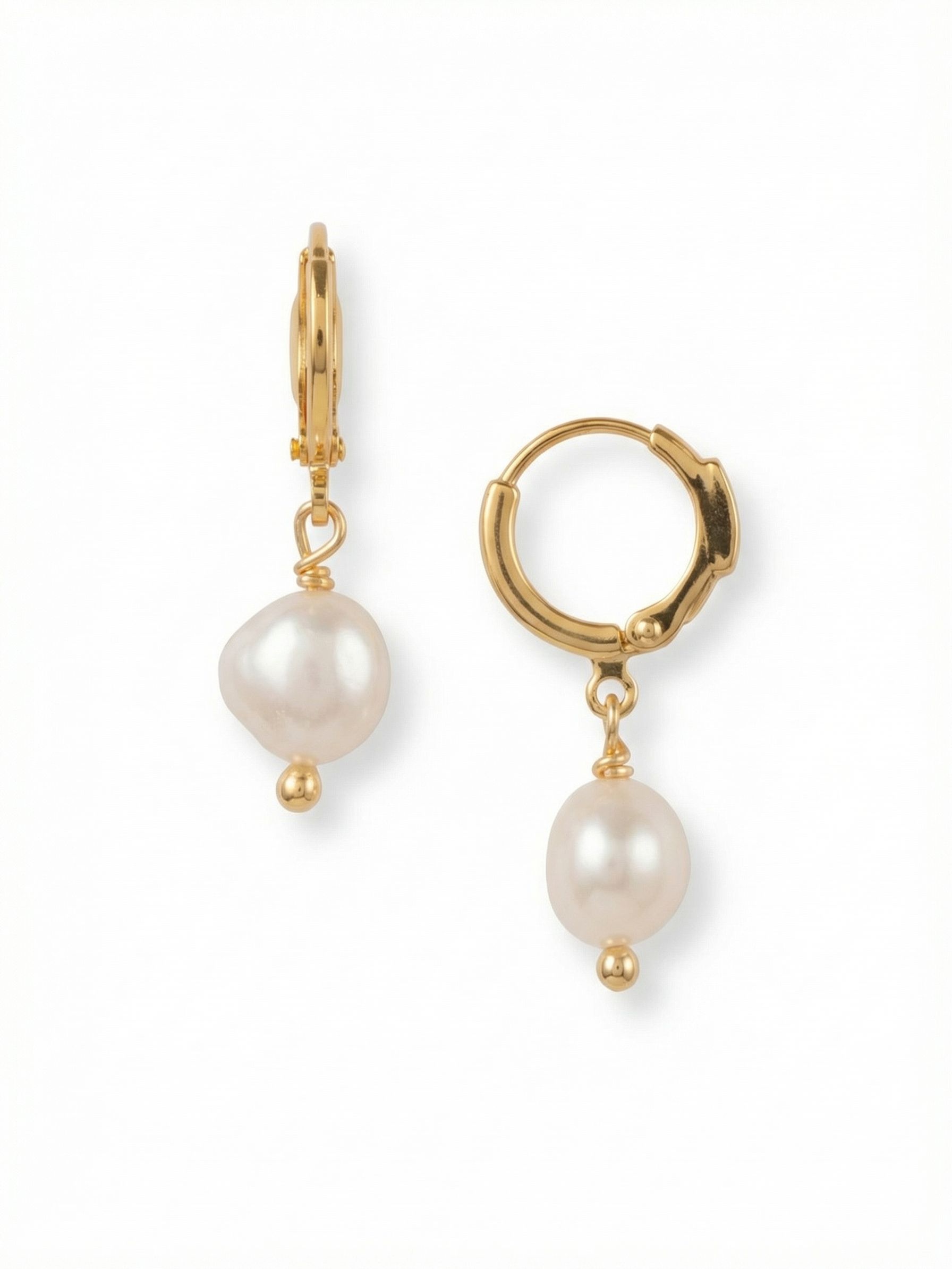 Pearl Huggie Hoop Earrings - 4EFZ11BGMDP - <p>A modern approach to the classic pearl drop. The small hoop clicks into place for a secure, close fit that feels light and comfortable throughout the day. Suspended below by a delicate wire wrap, a single white pearl provides a quiet touch of luster and gentle movement. At just over an inch long, this versatile earring adds an understated polish to your daily rotation.</p><ul>
<li>Single white pearls suspended for subtle, continuous movement</li>
<li>Delicate wire-wrapping finished with a small metallic bead</li>
<li>Huggie hoop with click-shut closure</li>
<li>Protective e-coat finish for lasting wear</li>
<li>Includes signature organza pouch for gifting and travel</li>
</ul>
