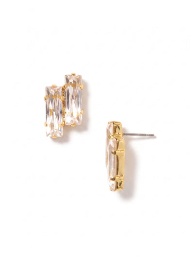 Brayden Stud Earrings - 4EGK8BGCRY - <p>The clean lines of step-cut crystals catch the light with subtle precision. These architectural post earrings arrange clear baguettes in a bright gold-tone setting, creating a structured silhouette that reads clearly from across a room. At three-quarters of an inch long, they carry a distinct presence while remaining completely effortless to wear. The included oversized comfort backs keep the geometric design sitting perfectly balanced and secure all day.</p><ul>
<li>Twin baguette crystals create an architectural symmetry</li>
<li>Linear step cuts deliver a distinctive flash of light</li>
<li>Post with oversized comfort-clutch back</li>
<li>Protective e-coat finish for lasting wear</li>
<li>Includes signature organza pouch for gifting and travel</li>
</ul>