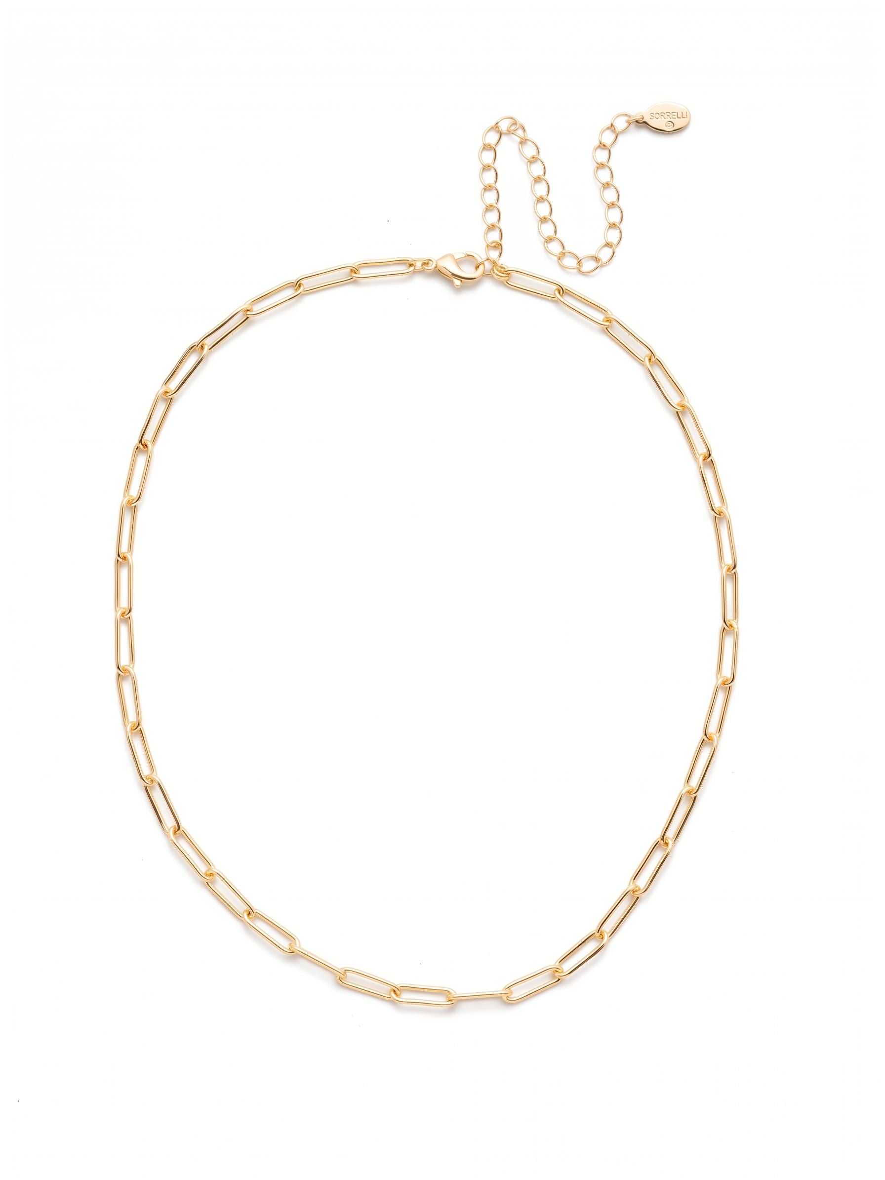 Jacinda Tennis Necklace - 4NES13BGCRY - <p>Clean lines define this structural paperclip chain. The elongated open links lie cleanly across the collarbone, offering a steady gleam that works beautifully alone or as an anchor for layered styling. The unembellished metalwork brings a quiet polish to your daily rotation while feeling entirely weightless in motion. With an adjustable extension chain to tailor the drop to any neckline, this piece quickly becomes a reliable foundation for your personal collection.</p><ul>
<li>Elongated open links create a clean structural profile</li>
<li>Lightweight unembellished metalwork designed for easy layering</li>
<li>Lobster claw clasp</li>
<li>4-inch adjustable extension chain</li>
<li>Protective e-coat finish for lasting wear</li>
<li>Includes signature organza pouch for gifting and travel</li>
</ul>