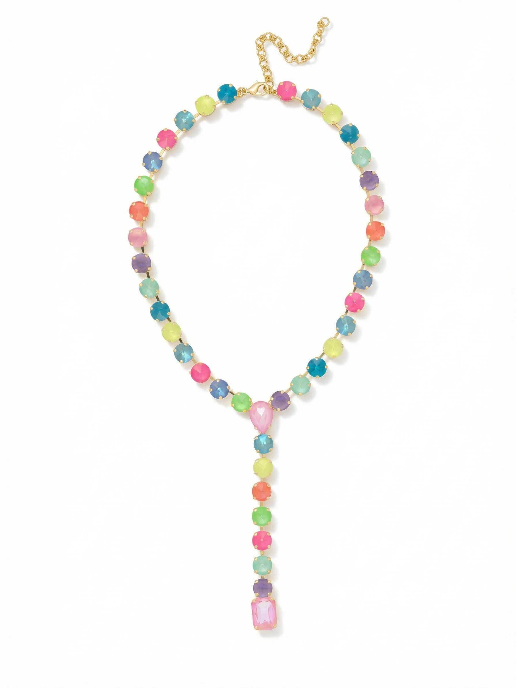 Lucille Lariat Statement Necklace - 4NFL3BGCCA - <p>A fluid lariat silhouette built entirely from saturated, closely set crystals. Bright shades of electric yellow, mint, and Caribbean blue drape comfortably around the neck, converging at a soft pink teardrop stone. From this junction, a single colorful line drops downward, weighted by an emerald-cut crystal to keep the necklace anchored as you move. The flexible chain construction ensures the piece shifts naturally with your body. By adjusting the clasp, you control exactly where the pendant rests, whether framing a low neckline or detailing a simple silk blouse.</p><ul>
<li>Fluid Y-necklace silhouette that elongates the neckline</li>
<li>Vibrant spectrum of bright and pastel colored crystals</li>
<li>Lobster claw clasp</li>
<li>4-inch adjustable extension chain</li>
<li>Protective e-coat finish for lasting wear</li>
<li>Includes signature organza pouch for gifting and travel</li>
</ul>