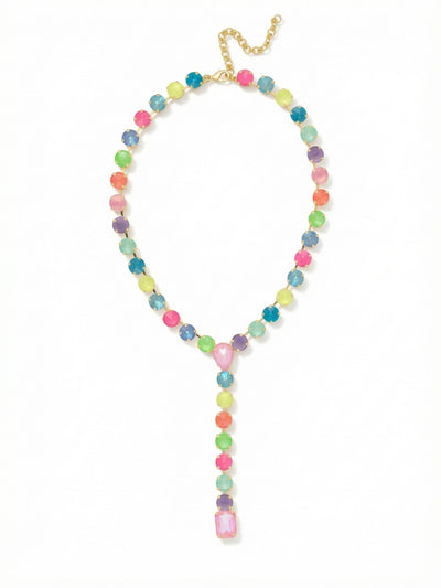 Lucille Lariat Statement Necklace - 4NFL3BGCCA - <p>A fluid lariat silhouette built entirely from saturated, closely set crystals. Bright shades of electric yellow, mint, and Caribbean blue drape comfortably around the neck, converging at a soft pink teardrop stone. From this junction, a single colorful line drops downward, weighted by an emerald-cut crystal to keep the necklace anchored as you move. The flexible chain construction ensures the piece shifts naturally with your body. By adjusting the clasp, you control exactly where the pendant rests, whether framing a low neckline or detailing a simple silk blouse.</p><ul>
<li>Fluid Y-necklace silhouette that elongates the neckline</li>
<li>Vibrant spectrum of bright and pastel colored crystals</li>
<li>Lobster claw clasp</li>
<li>4-inch adjustable extension chain</li>
<li>Protective e-coat finish for lasting wear</li>
<li>Includes signature organza pouch for gifting and travel</li>
</ul>
