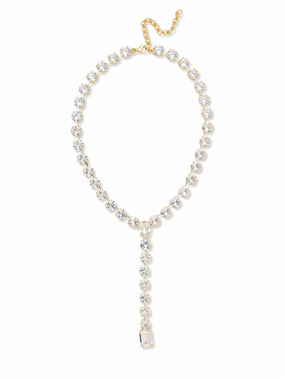 Lucille Lariat Statement Necklace - 4NFL3BGCRY - <p>A substantial line of large round crystals forms a fluid collar that drops into a sharp lariat silhouette. The satisfying weight of the crystal-set chain grounds the necklace, keeping the central Y-shape perfectly aligned as you move through your evening. A pear-cut crystal anchors the junction, drawing the eye downward to a final, heavy emerald-cut drop. It offers a confident drape that fills deep necklines or provides crisp contrast over high-collared silks. An integrated extension chain allows you to tailor the plunge exactly where you want it.</p><ul>
<li>Fluid kette chain construction set with continuous round crystals</li>
<li>Anchored by alternating pear and emerald-cut crystal focal points</li>
<li>Lobster claw clasp</li>
<li>4-inch adjustable extension chain</li>
<li>Protective e-coat finish for lasting wear</li>
<li>Includes signature organza pouch for gifting and travel</li>
</ul>