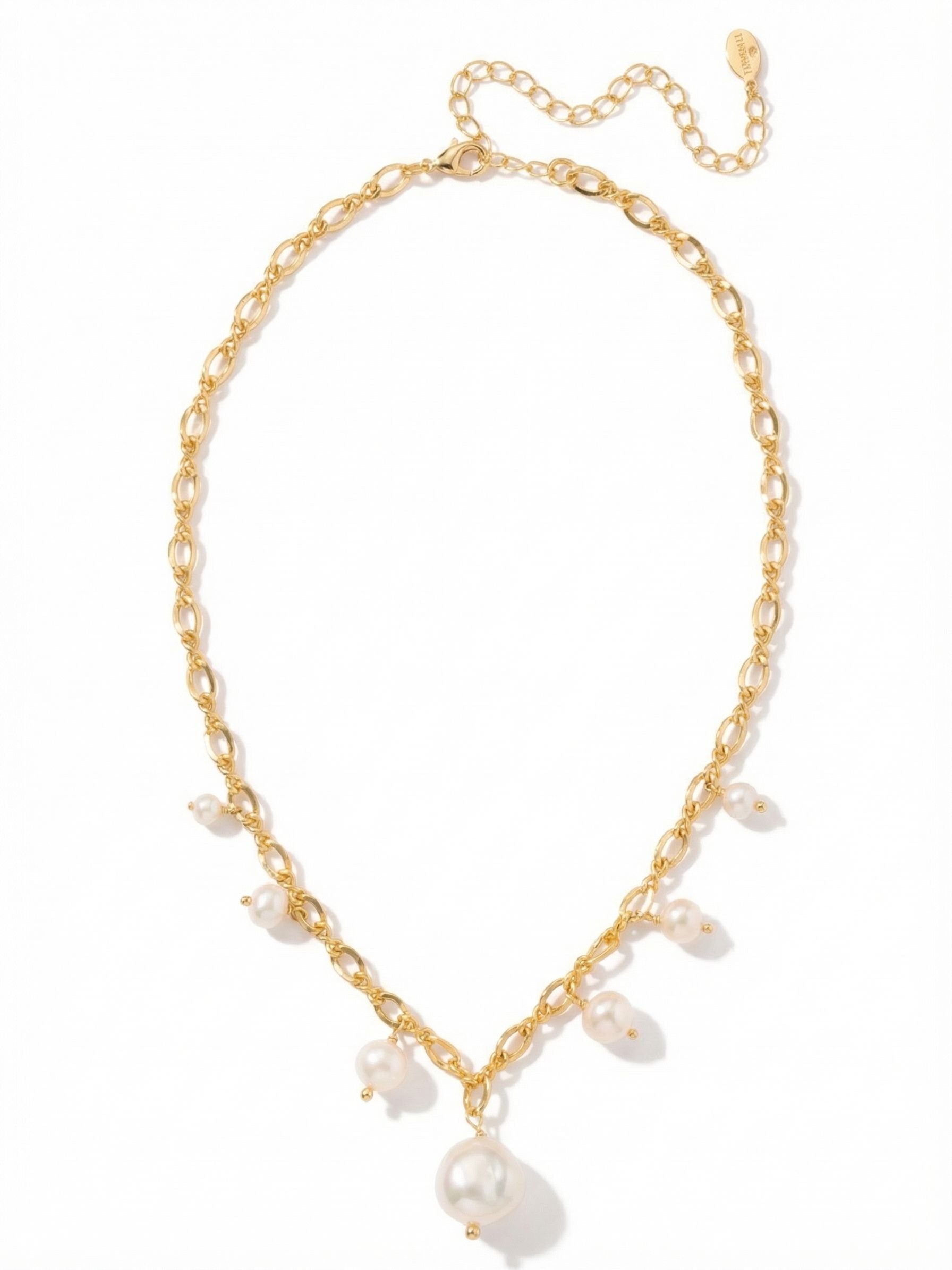 Amelia Pearl Tennis Necklace - 4NGE6BGMDP - <p>Seven pearls trace the collarbone along an airy gold-tone curb chain. The design alternates smooth round shapes with the organic texture of baroque pearls, creating a quiet rhythm that catches the light as you move. A larger baroque pearl drops at the center to anchor the open, delicate links. The included extension chain lets you adjust the drape, allowing the necklace to frame an open collar or adapt to a higher neckline depending on your day.</p><ul>
<li>Alternating smooth and baroque pearls create varied organic texture</li>
<li>Airy open-link chain keeps the piece feeling visually light</li>
<li>Lobster claw clasp</li>
<li>4-inch adjustable extension chain</li>
<li>Protective e-coat finish for lasting wear</li>
<li>Includes signature organza pouch for gifting and travel</li>
</ul>