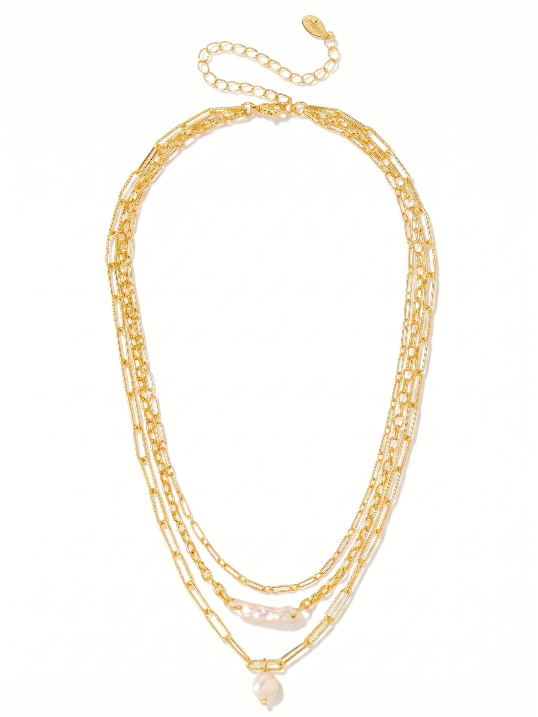 Imani Layered Necklace - 4NGK2BGMDP - <p>Two distinct pearls drop gracefully from an unexpected combination of paperclip and rolo chains. The interplay of elongated and round shapes brings a quiet, architectural rhythm to the neckline. The bright gold-tone links contrast with the soft luster of the pearls, catching the light as you move. A built-in extension chain allows you to adjust the drop precisely to your collarbone, making this an easy standalone piece or a textured base for a layered look.</p><ul>
<li>Asymmetric pairing of elongated and round pearl shapes</li>
<li>Mixed texture paperclip and rolo chain design</li>
<li>Lobster claw clasp</li>
<li>4-inch adjustable extension chain</li>
<li>Protective e-coat finish for lasting wear</li>
<li>Includes signature organza pouch for gifting and travel</li>
</ul>