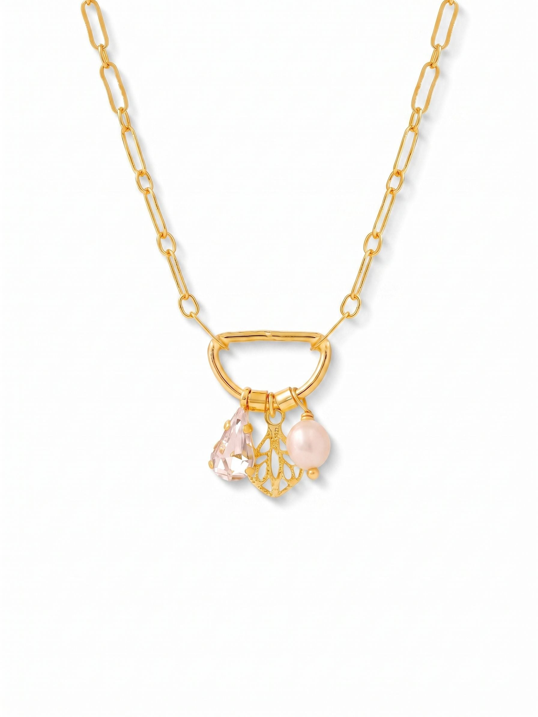 Gaia Charm Pendant Necklace - 4NGK7BGCRY - <p>This pendant finds its balance in contrasts, pairing the sharp facets of a clear pear-cut crystal with the soft, organic texture of a white baroque pearl. Set in bright gold-tone, the mixed materials create a focal point that rests comfortably just below the collarbone. The delicate chain includes an extension, letting you adjust the drop to suit whatever neckline you are wearing today. It brings a quiet polish to an everyday sweater or an open collar.</p><ul>
<li>Mixed media pendant combining faceted crystal with an organic baroque pearl</li>
<li>Pear-cut clear crystal provides a sharp visual contrast to the smooth pearl</li>
<li>Lobster claw clasp</li>
<li>4-inch adjustable extension chain</li>
<li>Protective e-coat finish for lasting wear</li>
<li>Includes signature organza pouch for gifting and travel</li>
</ul>