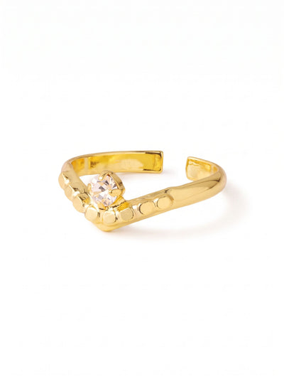 Mika Band Ring - 4RGK1BGCRY - <p>A single round-cut clear crystal provides a crisp focal point against the tactile texture of this ring's ball chain design. Finished in a bright gold-tone, the metallic detailing catches the light naturally with every gesture. The open adjustable band allows you to easily switch fingers or tweak the fit for lasting comfort, making this an effortless piece that adapts to you.</p><ul>
<li>Tactile ball chain construction adds unexpected texture to the band</li>
<li>A solitary clear crystal provides a crisp visual anchor</li>
<li>Adjustable ring band</li>
<li>Protective e-coat finish for lasting wear</li>
<li>Includes signature organza pouch for gifting and travel</li>
</ul>