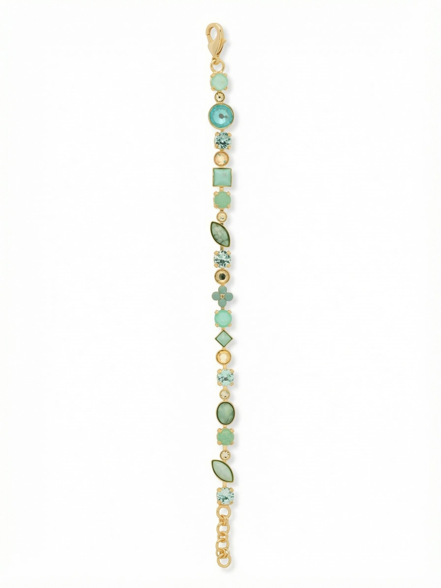 Crystal and Cabochon Tennis Bracelet - BAQ3BGCSD - <p>An unexpected take on the classic tennis line, built from a shifting sequence of shapes and textures. Opaque turquoise-hued cabochons anchor the design, intersected by faceted crystals in shades of aquamarine, mint, and pale yellow. The varied cuts create a dynamic rhythm that catches the light differently with every gesture. It brings the colors of a coastal retreat to your daily rotation, wearing beautifully alone or mingling with your favorite gold links. An extension chain allows for a customized drape.</p><ul>
<li>Rhythmic sequence of square, marquise, oval, and round stone cuts</li>
<li>Interplay of opaque howlite cabochons and faceted crystals</li>
<li>Lobster claw clasp</li>
<li>3/4-inch adjustable extension chain</li>
<li>Protective e-coat finish for lasting wear</li>
<li>Includes signature organza pouch for gifting and travel</li>
</ul>