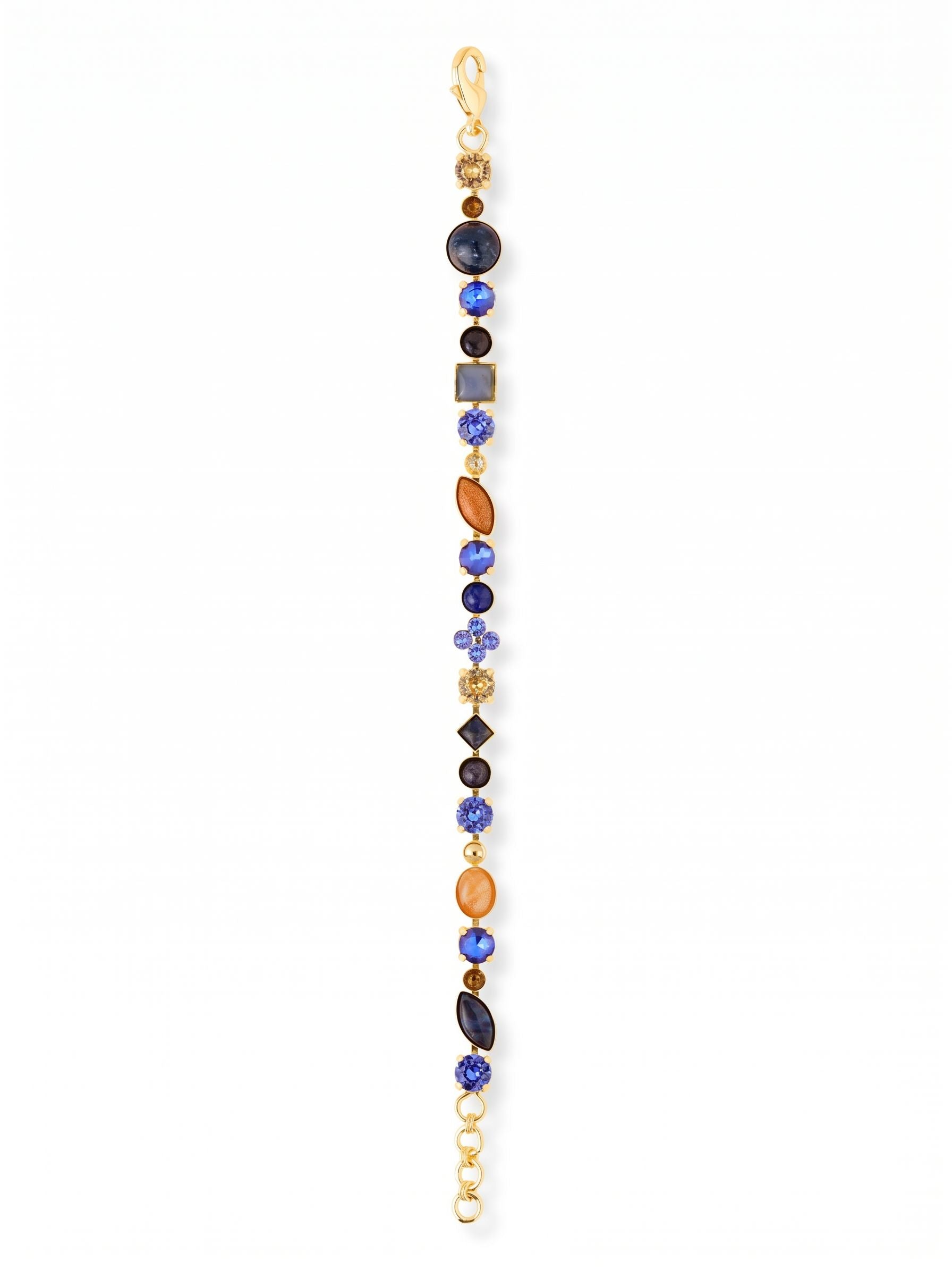 Crystal and Cabochon Tennis Bracelet - BAQ3BGDNM - <p>Deep lapis lazuli and polished sodalite alternate with sharp sapphire and smoked topaz crystals in this textured take on the classic tennis bracelet. The mix of smooth cabochons and faceted stones creates a nuanced line of color that shifts in the light as you move. A slender profile keeps the piece comfortable for daily wear, anchored by an adjustable chain for a precise fit. It is a quiet study in contrast that pairs naturally with your favorite everyday staples.</p><ul>
<li>Alternating opaque cabochons and faceted crystals</li>
<li>Eclectic mix of round, square, and marquise cuts</li>
<li>Lobster claw clasp</li>
<li>3/4-inch adjustable extension chain</li>
<li>Protective e-coat finish for lasting wear</li>
<li>Includes signature organza pouch for gifting and travel</li>
</ul>