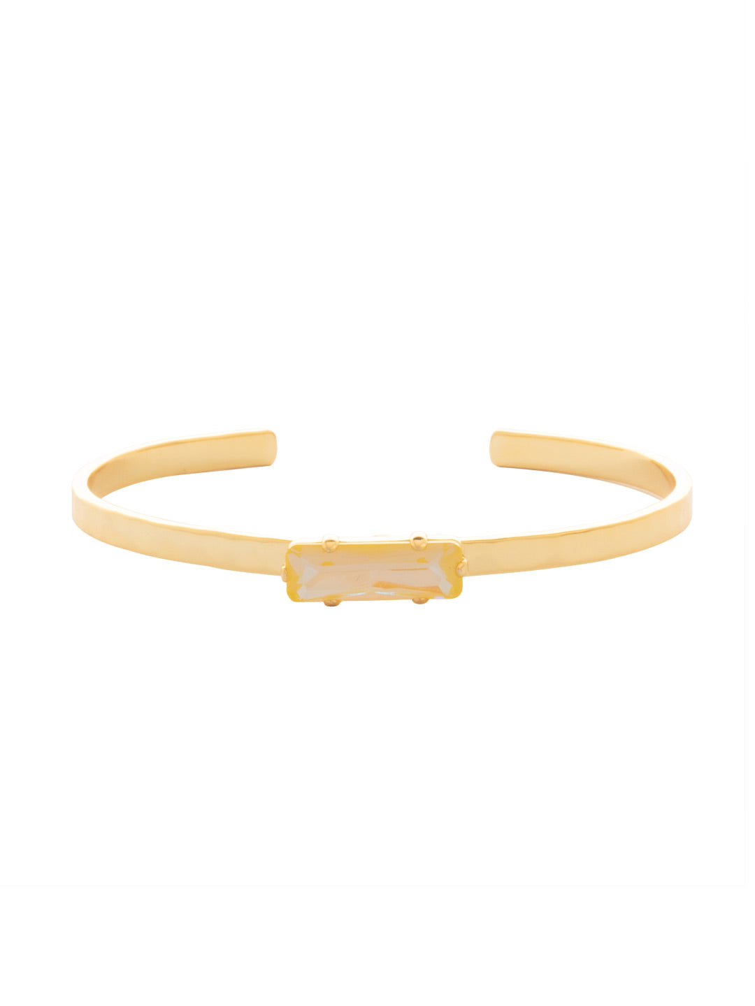 Bindi Cuff Bracelet - BCW13BGLTD - <p>A simple baguette crystal sits on top of our hammered cuff to create a textured, classic look. Perfect for stacking or shining on it's own! From Sorrelli's Light Topaz Delite collection in our Bright Gold-tone finish.</p>