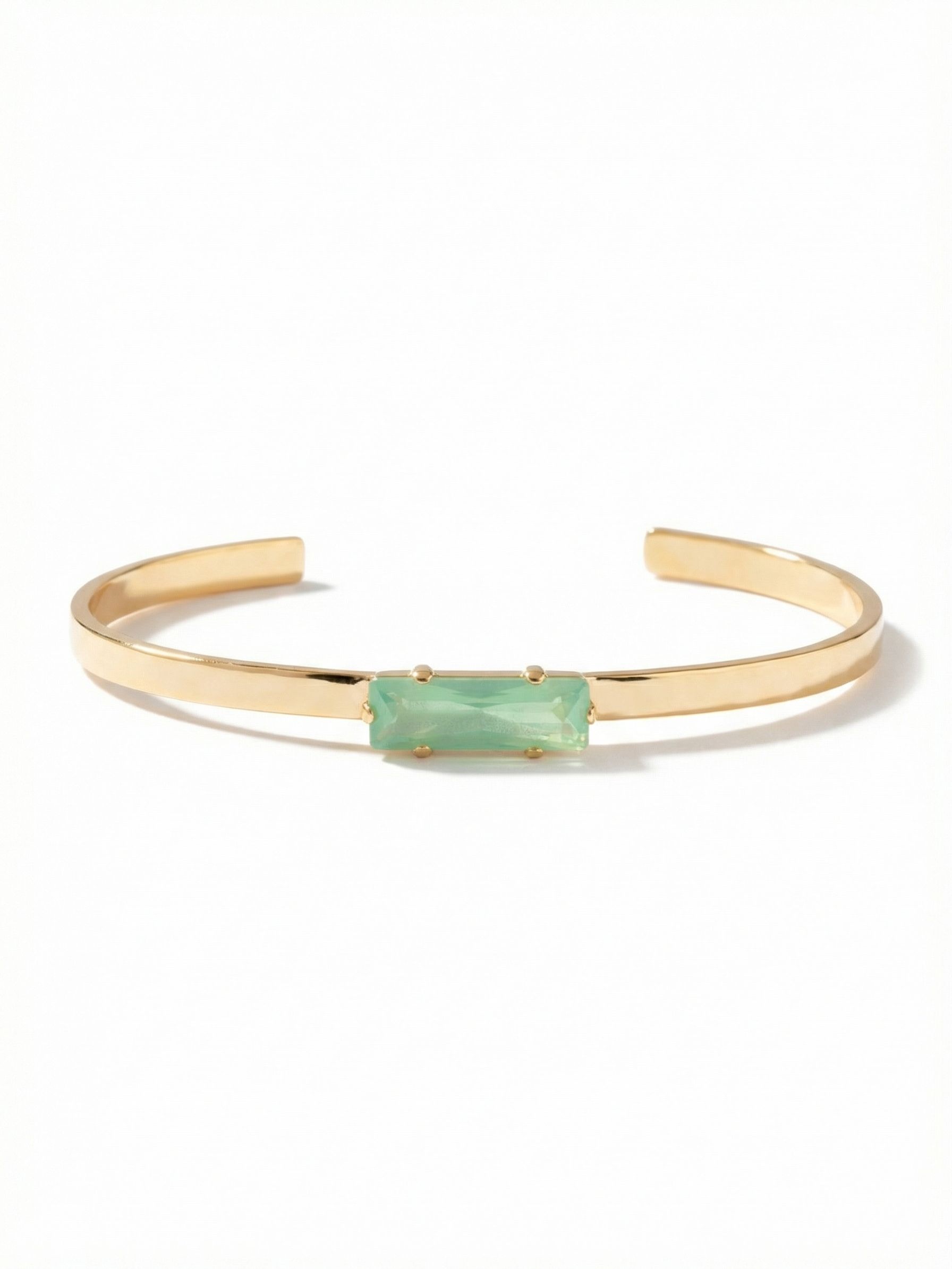 Bindi Cuff Bracelet - BCW13BGPAC - <p>A single elongated baguette-cut Pacific Opal anchors this minimalist metal cuff. The clean geometry of the horizontal stone plays against the slender, polished band. Designed as an open style, it slides on effortlessly, adapting quietly to your daily movements. Worn alone, it provides a precise point of color and light. Mixed into a stack of link chains and wider bangles, it adds a structured, architectural element to your everyday collection.</p><ul>
<li>Horizontal baguette-cut center stone</li>
<li>Slender band designed for structured stacking</li>
<li>Adjustable open cuff slides on easily</li>
<li>Protective e-coat finish for lasting wear</li>
<li>Includes signature organza pouch for gifting and travel</li>
</ul>