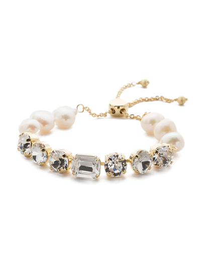 Cadenza Slider Bracelet - BEC14BGCRY - <p>A classic line bracelet reimagined with a adjustable slider clasp. A pattern of crystals and pearls give this bracelet all around allure. From Sorrelli's Crystal collection in our Bright Gold-tone finish.</p>