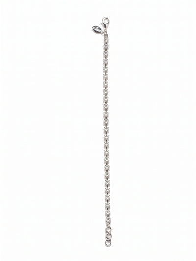 Marnie Tennis Bracelet - BFA2PDCRY - <p>A definitive take on an absolute essential. This slender tennis bracelet creates an unbroken line of clear crystal that catches the light with every gesture. The articulated rhinestone chain flexes beautifully, moving fluidly with your arm rather than feeling stiff or restrictive. An adjustable extension chain lets you find the exact right fit, allowing the piece to work just as well as a solo signature or layered seamlessly into a daily stack.</p><ul>
<li>Slender single-strand profile ideal for daily layering</li>
<li>Articulated chain construction designed for fluid movement</li>
<li>Lobster claw clasp</li>
<li>3/4-inch adjustable extension chain</li>
<li>Protective e-coat finish for lasting wear</li>
<li>Includes signature organza pouch for gifting and travel</li>
</ul>