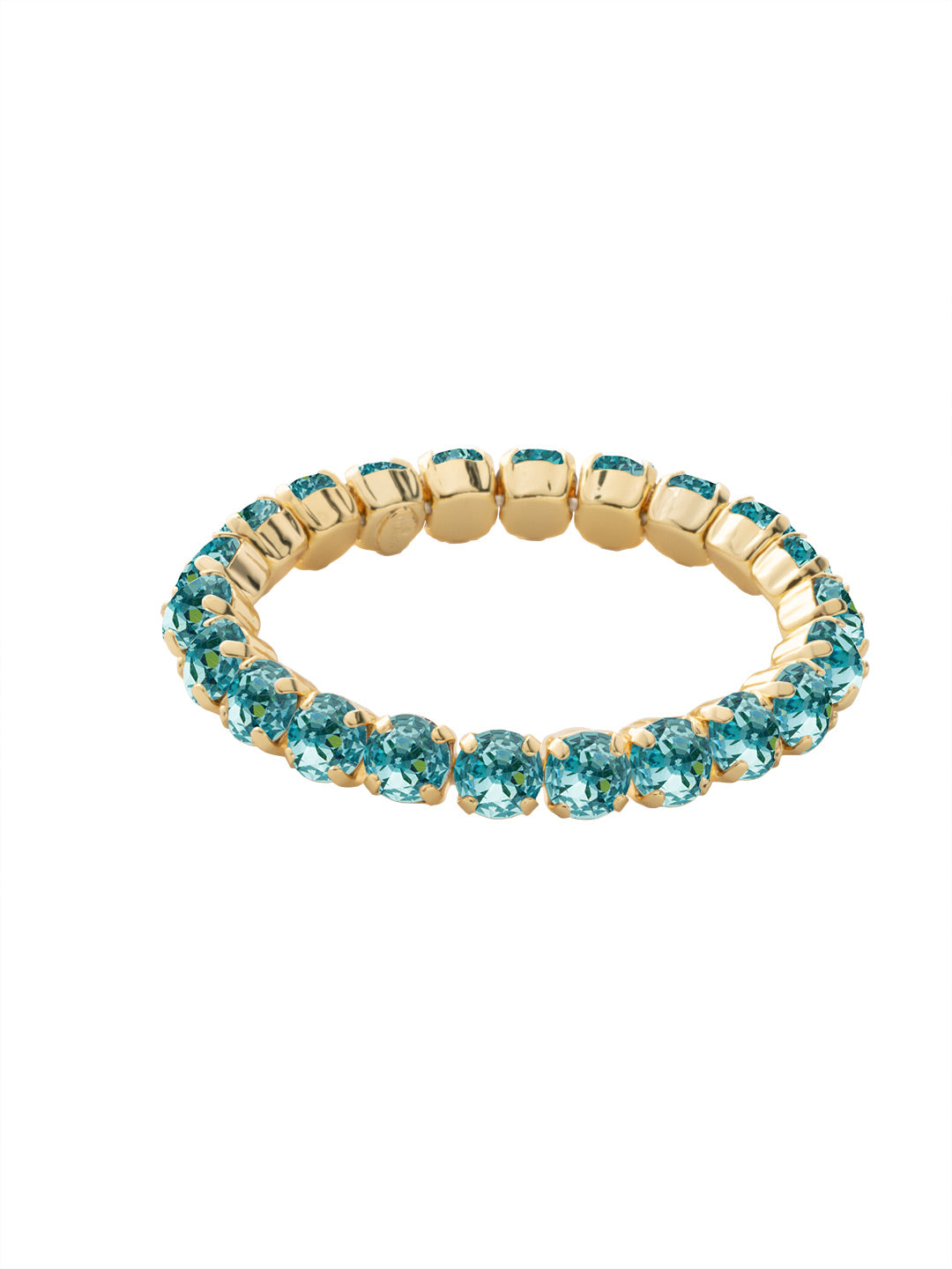 Sienna Stretch Bracelet - BFD50BGAQU - <p>A modern take on a classic style, the Sienna Stretch Bracelet features a line of crystals on a sturdy jewelers' filament, stretching to fit most wrists comfortably, without the hassle of a clasp! From Sorrelli's Aquamarine collection in our Bright Gold-tone finish.</p>