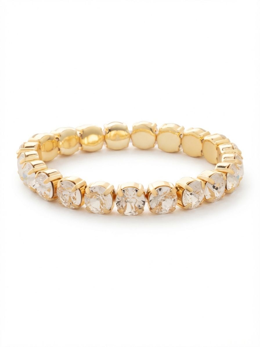 7 inch Sienna Stretch Bracelet - BFD50BGCRY - <p>A continuous line of round-cut clear crystals catches the light with every gesture. Designed without a clasp, this bracelet slips easily over your hand for a seamless morning routine. The substantial scale of the stones gives the piece a satisfying weight, anchoring it securely on your arm while the stretch construction adapts to your movement. Wear it alone as a bright focal point or slide it into a layered stack of metallic cuffs to break up textures.</p><ul>
<li>Continuous line of faceted round crystals</li>
<li>Seamless design creates an unbroken circle of light</li>
<li>Stretch easy slip-on design</li>
<li>Protective e-coat finish for lasting wear</li>
<li>Includes signature organza pouch for gifting and travel</li>
</ul>
