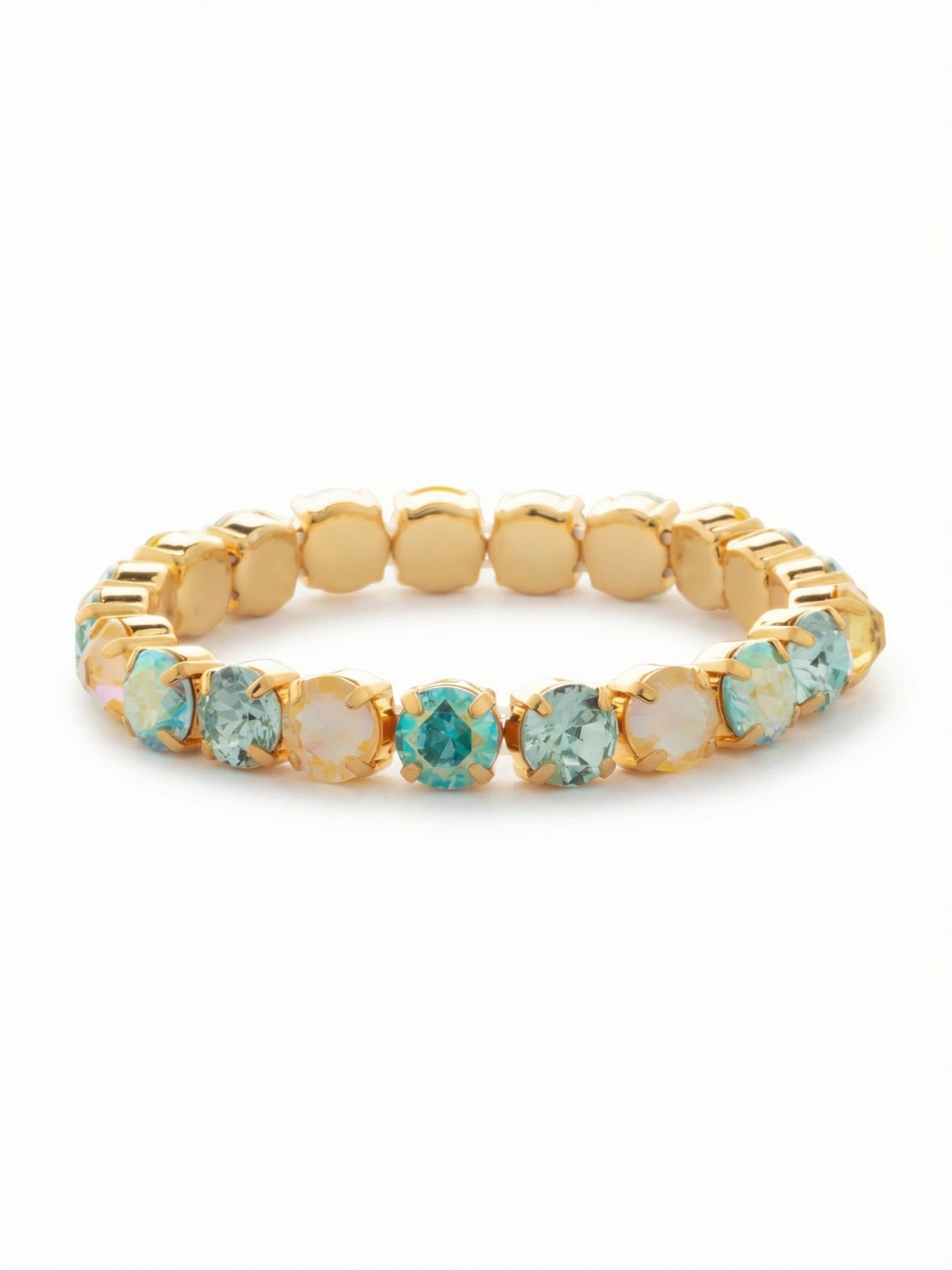 7 inch Sienna Stretch Bracelet - BFD50BGCSD - <p>A continuous loop of round-cut crystals, this stretch bracelet rolls effortlessly onto your wrist with no clasp to navigate. The design balances warm light topaz with the shifting blue hues of aquamarine aurora borealis, each stone individually prong-set in bright gold-tone cups. The flexible construction provides a secure, comfortable fit that accommodates your natural movement. Worn solo or layered into a daily stack, it brings a relaxed, colorful presence to your everyday routine.</p><ul>
<li>Alternating round-cut crystals in a continuous unbroken loop</li>
<li>Flexible design rolls easily over the hand for immediate wear</li>
<li>Stretch easy slip-on design</li>
<li>Protective e-coat finish for lasting wear</li>
<li>Includes signature organza pouch for gifting and travel</li>
</ul>