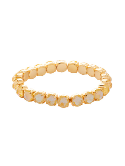 7 inch Sienna Stretch Bracelet - BFD50BGLTD - <p>A modern take on a classic style, the Sienna Stretch Bracelet features a line of crystals on a sturdy jewelers' filament, stretching to fit most wrists comfortably, without the hassle of a clasp! (7 inches in diameter, fits average wrist sizes) From Sorrelli's Light Topaz Delite collection in our Bright Gold-tone finish.</p>