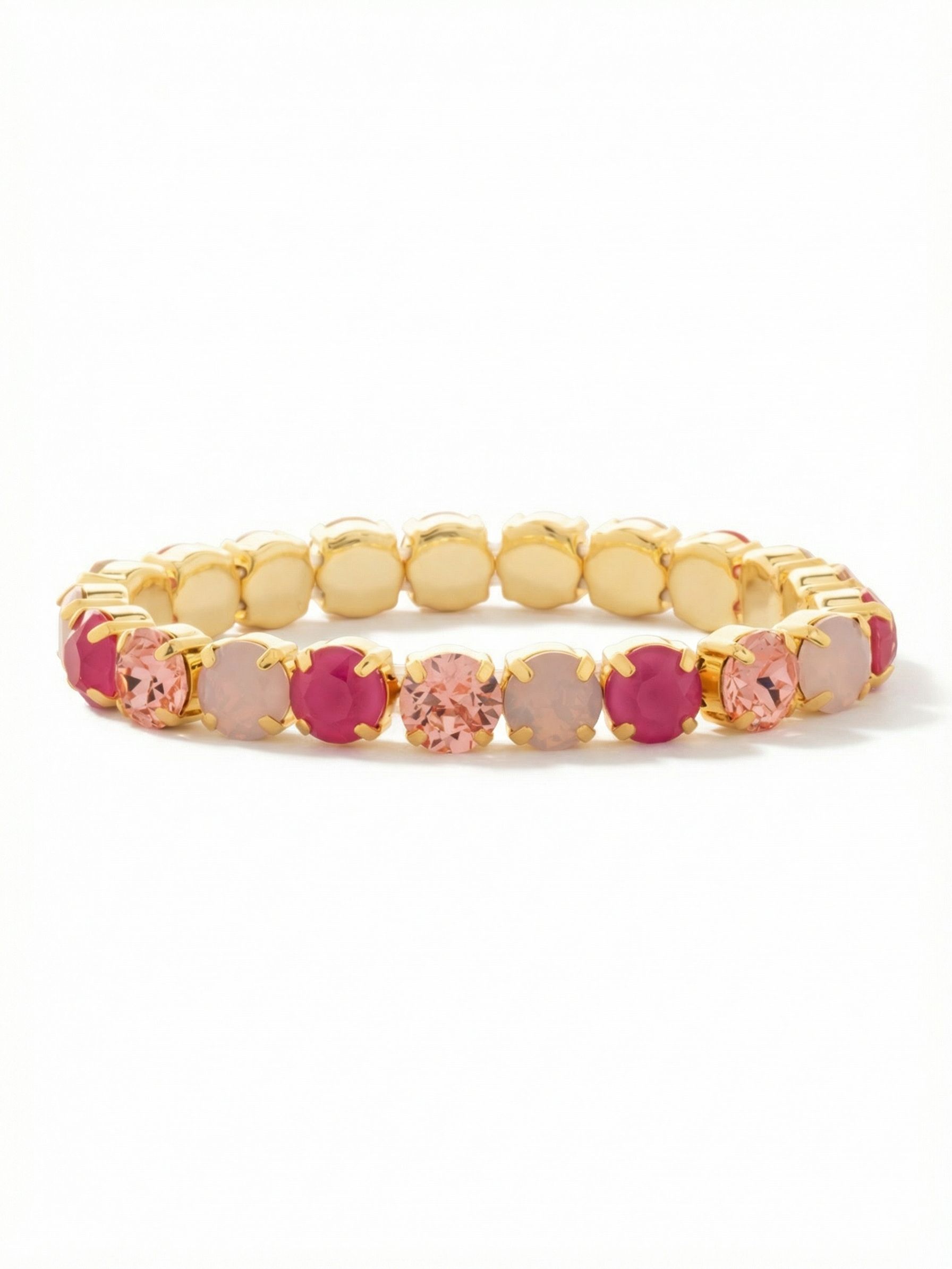 7 inch Sienna Stretch Bracelet - BFD50BGPRO - <p>A continuous band of alternating opal, soft rose, and lacquered pink crystals brings saturated color to your daily rotation. The stretch construction eliminates the need to fumble with clasps, sliding easily over your hand with a secure, comfortable fit. It carries a grounded, intentional weight that registers beautifully when you move. Wear it as a standalone touch of vibrant pink, or let it mingle comfortably alongside your favorite watch and thin gold cuffs.</p><ul>
<li>Alternating opaque and translucent pink crystals create visual rhythm</li>
<li>Flexible stretch base allows for easy, clasp-free wear</li>
<li>Stretch easy slip-on design</li>
<li>Protective e-coat finish for lasting wear</li>
<li>Includes signature organza pouch for gifting and travel</li>
</ul>