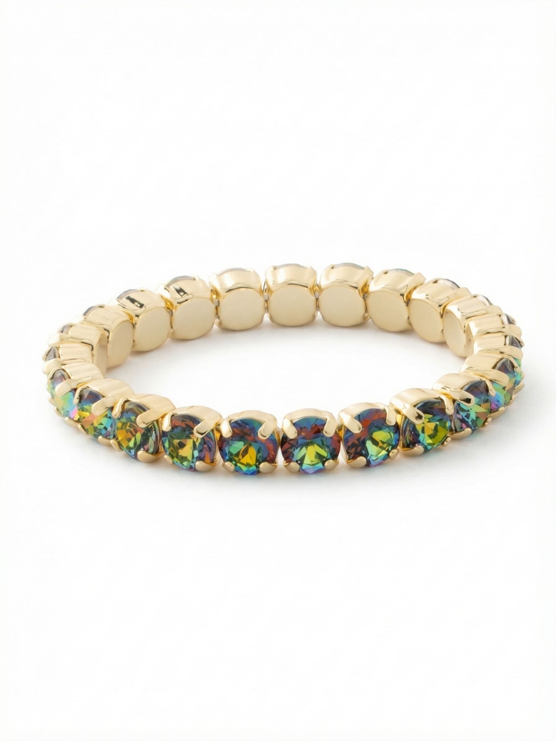 7 inch Sienna Stretch Bracelet - BFD50BGVO - <p>A continuous line of iridescent round crystals creates a shifting spectrum of deep purples, fiery oranges, and vivid greens as your wrist moves. The flexible design slips on effortlessly, eliminating the morning fumble with tiny clasps. At just under half an inch wide, it offers enough presence to anchor a stack of delicate chains while feeling substantial enough to wear alone on busy days.</p><ul>
<li>Unbroken line of color-shifting round crystals</li>
<li>Flexible stretch construction adapts to movement without a clasp</li>
<li>Stretch easy slip-on design</li>
<li>Protective e-coat finish for lasting wear</li>
<li>Includes signature organza pouch for gifting and travel</li>
</ul>
