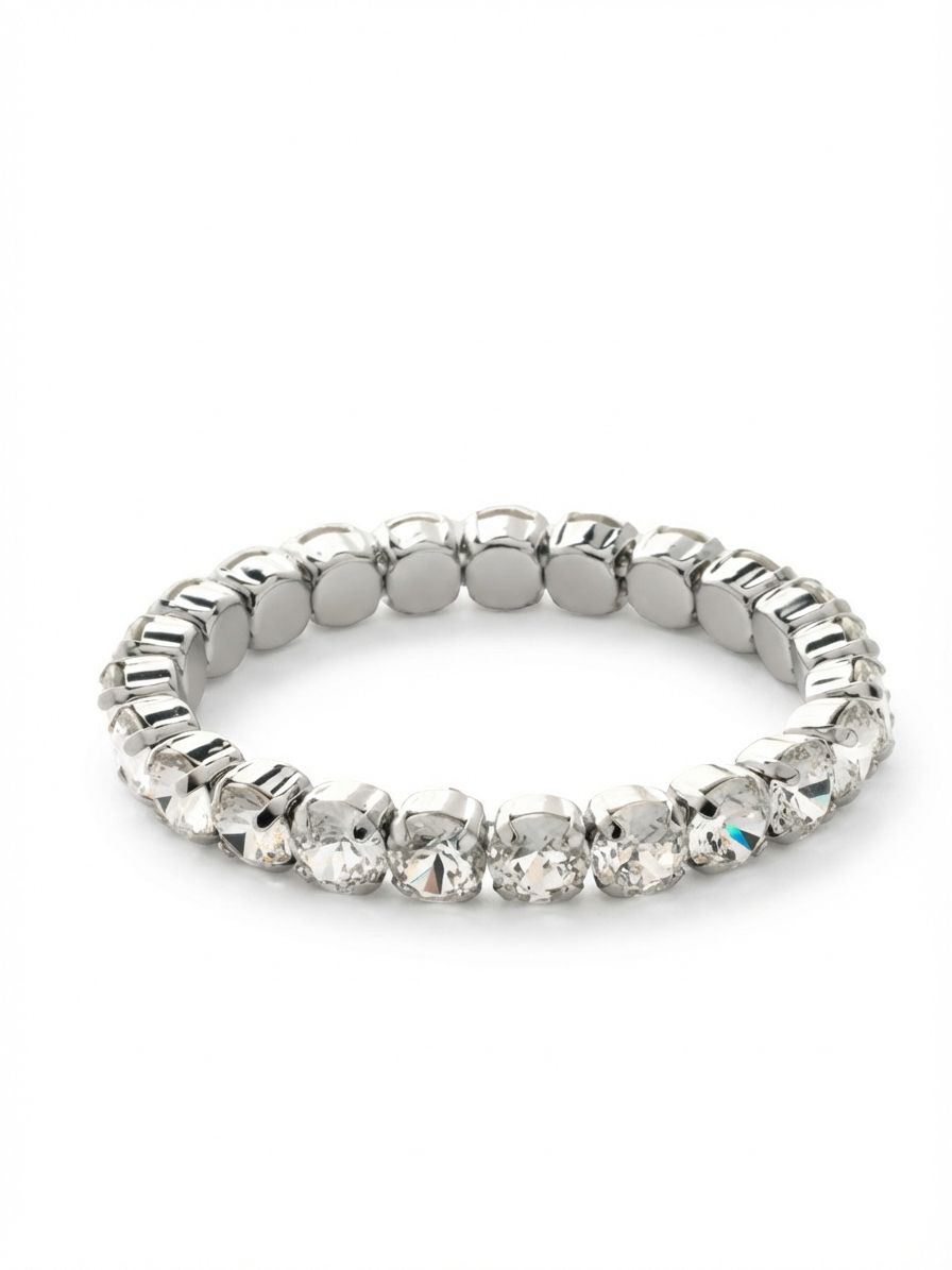 7 inch Sienna Stretch Bracelet - BFD50PDCRY - <p>A classic crystal line reimagined for absolute ease. This stretch bracelet slips over your hand in a second, delivering a continuous circle of clear, round-cut crystals set in a bright metal finish. Without a clasp to interrupt the design, it offers a seamless look from every angle and flexes naturally with your movements. It carries enough visual weight to wear alone but organically invites layering alongside your daily watch or a stack of rigid cuffs.</p><ul>
<li>Continuous row of uniform round-cut crystals</li>
<li>Flexible stretch design built for effortless stacking</li>
<li>Stretch easy slip-on design</li>
<li>Protective e-coat finish for lasting wear</li>
<li>Includes signature organza pouch for gifting and travel</li>
</ul>