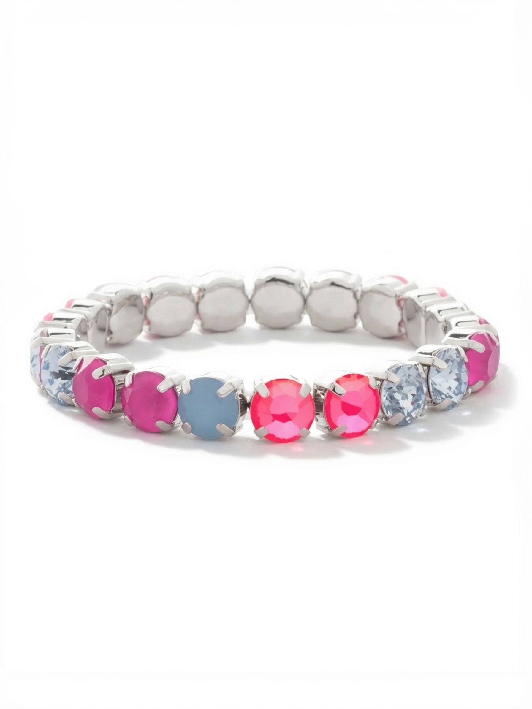 7 inch Sienna Stretch Bracelet - BFD50PDPBZ - <p>A continuous band of round crystals brings a vivid pop of color to your everyday rotation. Electric pink and peony pink lacquer catch the light, anchored by the cool contrast of air blue opal and light sapphire. The elastic construction easily rolls over your hand, eliminating the need to fumble with a clasp. It carries enough visual weight to wear solo, yet layers effortlessly into a stack of your favorite sparkle.</p><ul>
<li>Continuous line of alternating vibrant pink and soft blue round crystals</li>
<li>Flexible construction rolls easily over the hand for immediate wear</li>
<li>Protective e-coat finish for lasting wear</li>
<li>Stretch easy slip-on design</li>
<li>Includes signature organza pouch for gifting and travel</li>
</ul>