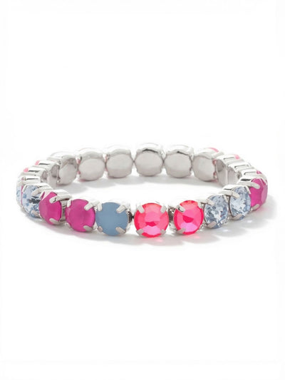 7 inch Sienna Stretch Bracelet - BFD50PDPBZ - <p>A continuous band of round crystals brings a vivid pop of color to your everyday rotation. Electric pink and peony pink lacquer catch the light, anchored by the cool contrast of air blue opal and light sapphire. The elastic construction easily rolls over your hand, eliminating the need to fumble with a clasp. It carries enough visual weight to wear solo, yet layers effortlessly into a stack of your favorite sparkle.</p><ul>
<li>Continuous line of alternating vibrant pink and soft blue round crystals</li>
<li>Flexible construction rolls easily over the hand for immediate wear</li>
<li>Protective e-coat finish for lasting wear</li>
<li>Stretch easy slip-on design</li>
<li>Includes signature organza pouch for gifting and travel</li>
</ul>